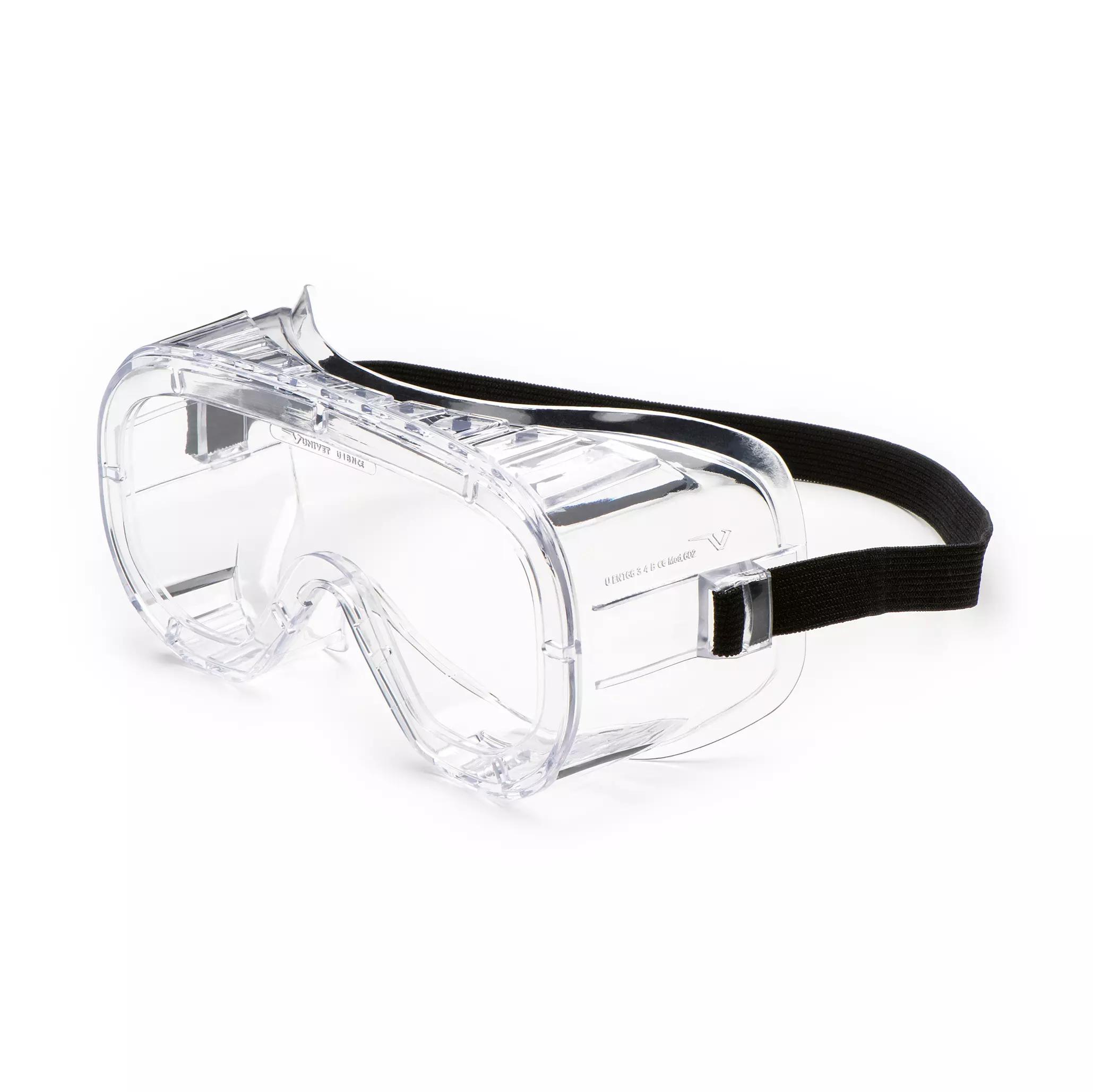 Eine Vollsicht-Schutzbrille Classic mit klarer, beschlagfreier Scheibe und schwarzem Kopfband liegt unbenutzt auf einer weißen Fläche.