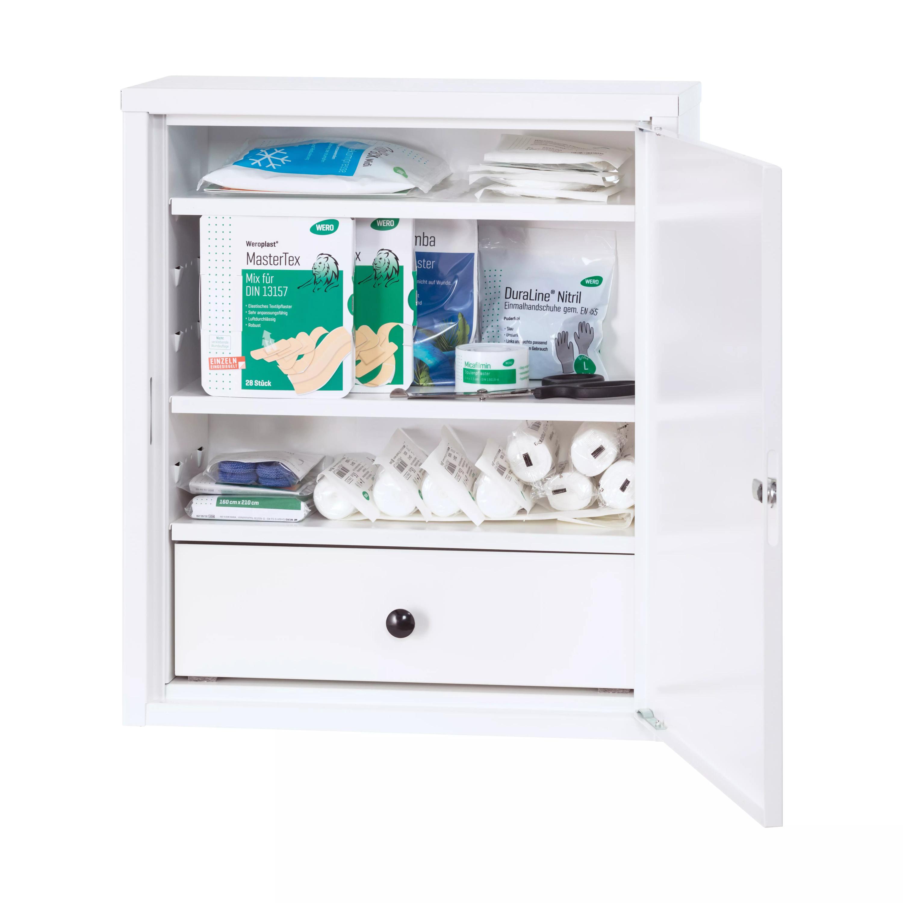 WERO Verbandschrank Midi Xtra 222 leer, weiß, mit offener Tür, drei verstellbaren Einlegeböden und einer kleinen Schublade sichtbar.