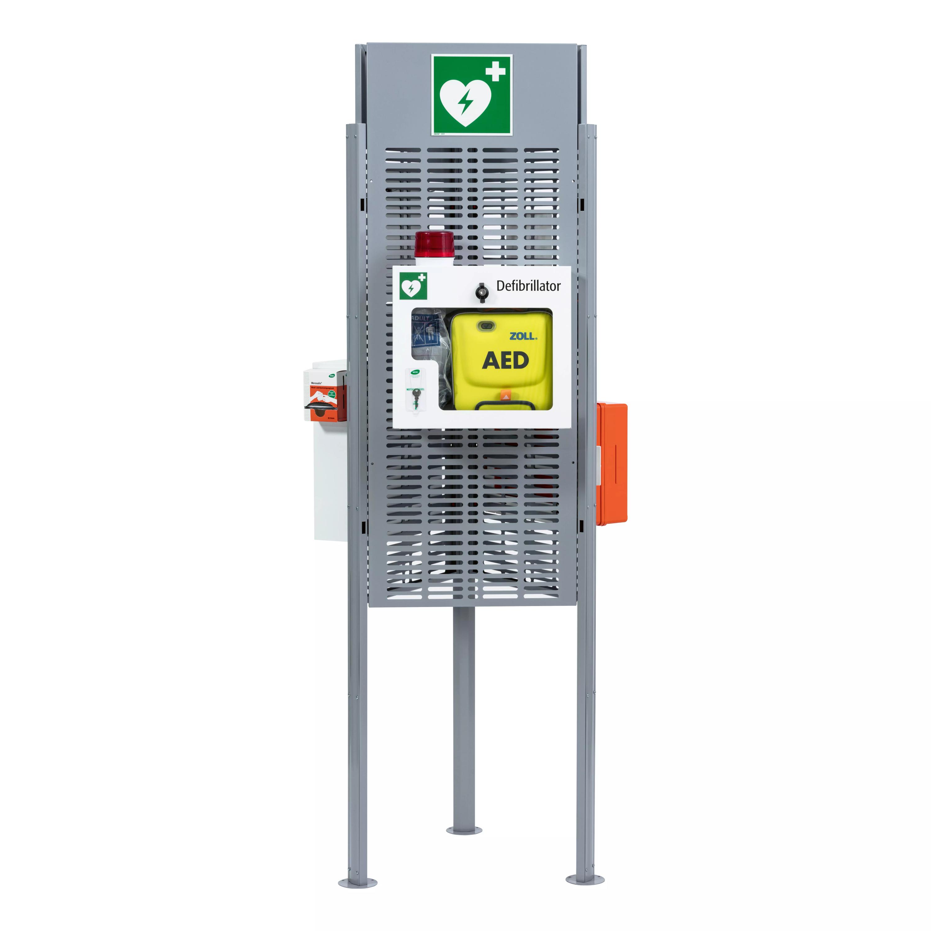 Eine aufrecht stehende Weroflex® Station - 3-Seiten Komplett-Set mit grünem Kreuz, rotem Knopf, gelbem AED und flexiblem Stauraum.