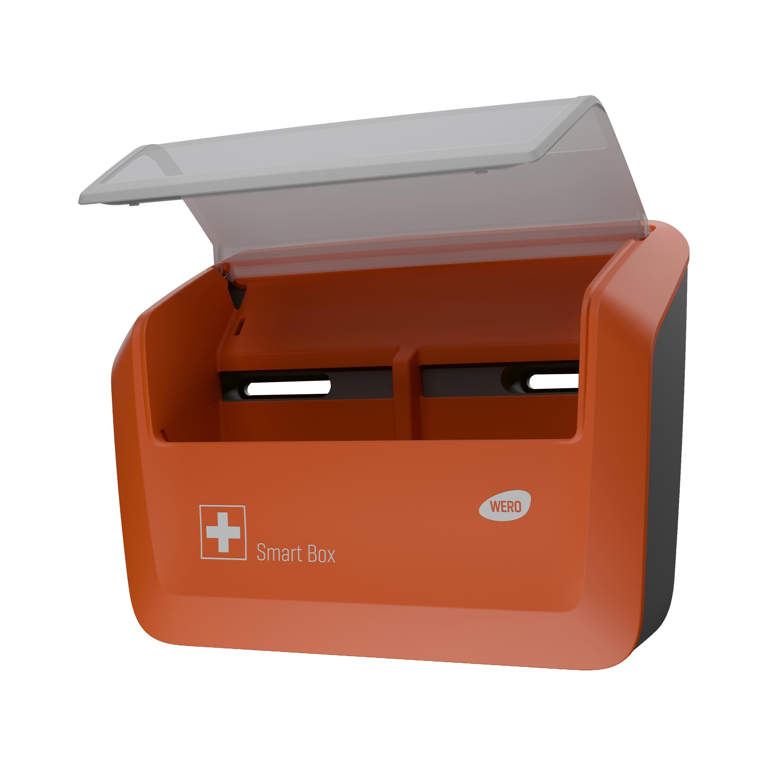 Eine geöffnete WERO Smart Box Pflasterspender gefüllt mit Werosmart® X-Ray Detect Pflasterstrips und Fingerpflaster zeigt zwei schwarze Fächer und transparenten Deckel.