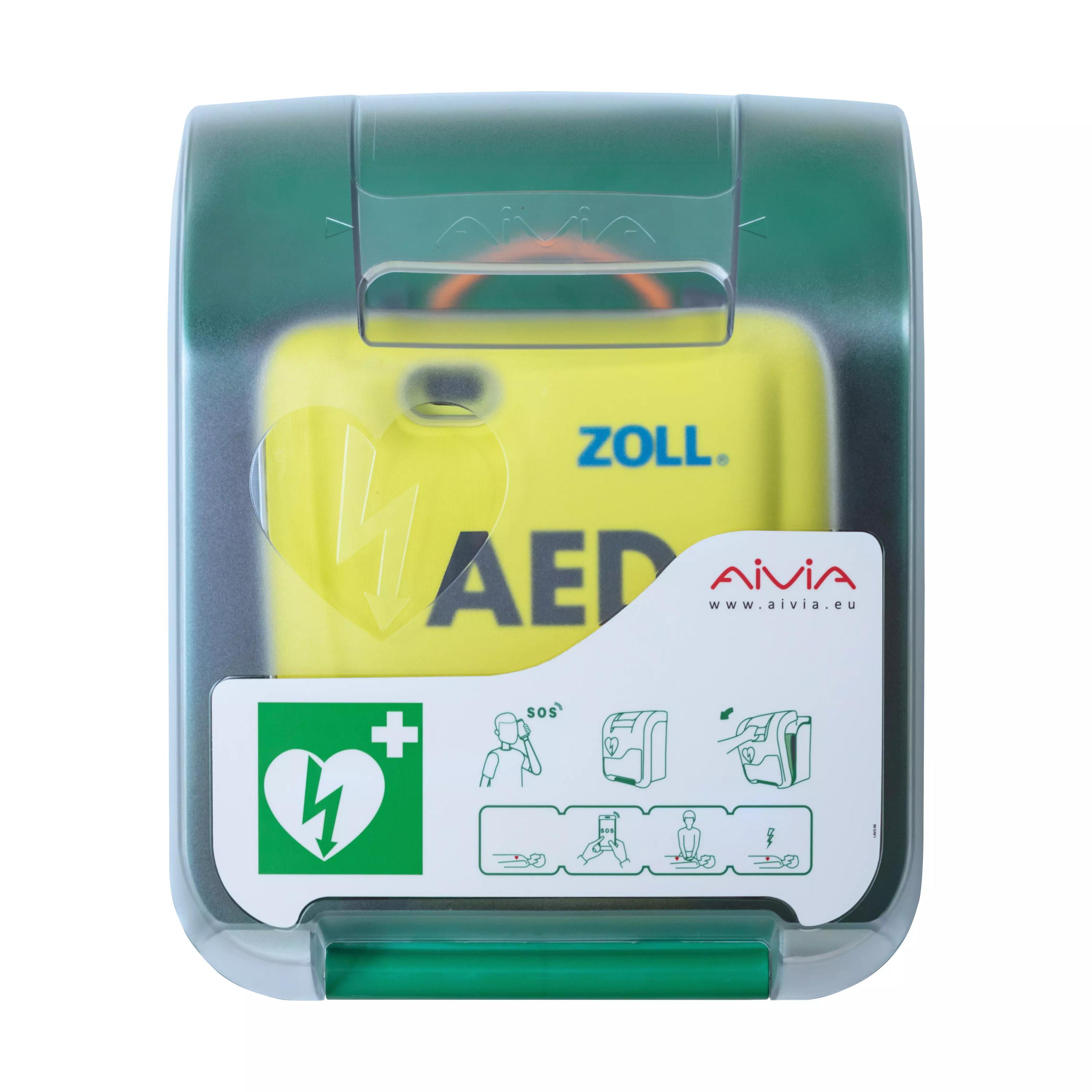 AED-Wandschrank AIVIA IN 100 aus robustem ABS-Kunststoff mit transparenter Abdeckung und grünem Griff, gelber Defibrillator sichtbar.