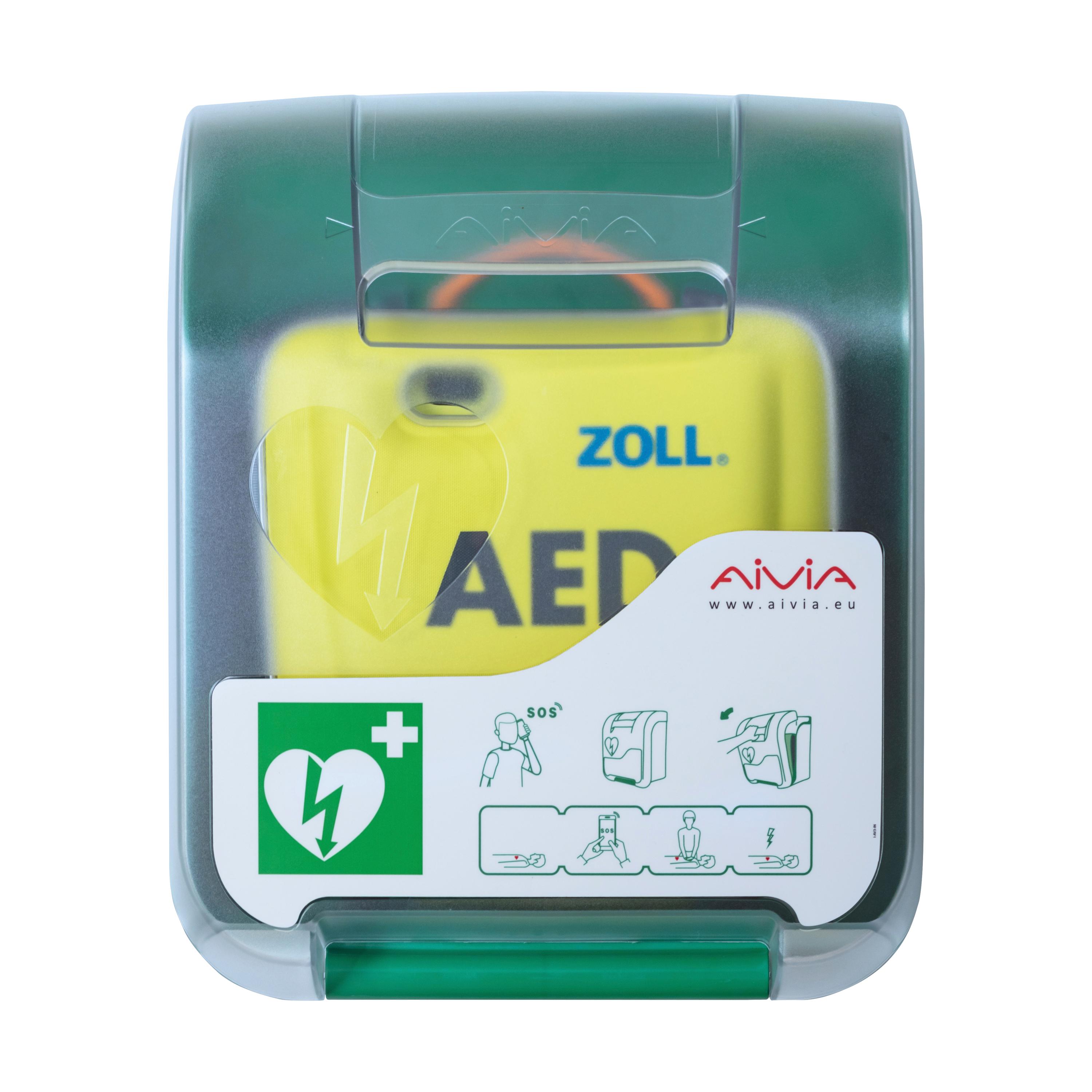 AED-Wandschrank AIVIA IN 100 aus robustem ABS-Kunststoff mit transparenter Abdeckung und grünem Griff, gelber Defibrillator sichtbar.