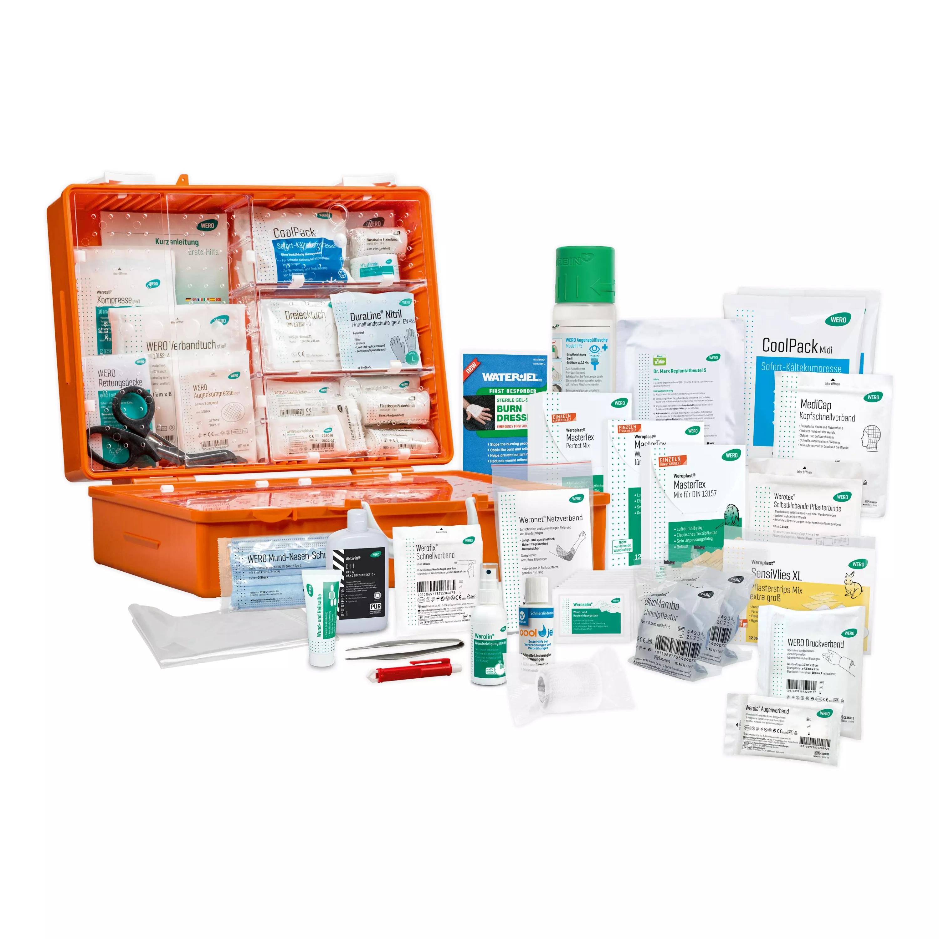 Ein geöffneter Werotop® 450 Erste Hilfe Koffer Universal DIN 13157 zeigt übersichtlich sortierte Füllung nach DIN 13157, Wundreinigungsspray und CoolPack.