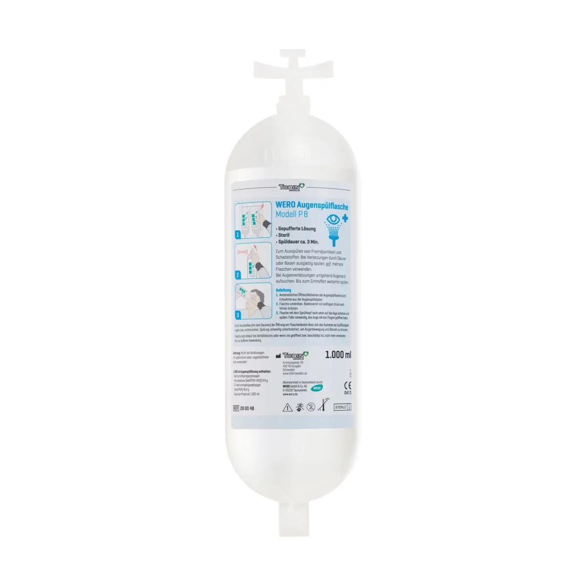 Eine ungeöffnete WERO Augenspülflasche Modell P 8 gepufferte Lösung, steril, mit seitlichem Griff und Ausguss, deutsche Gebrauchsanleitung sichtbar.