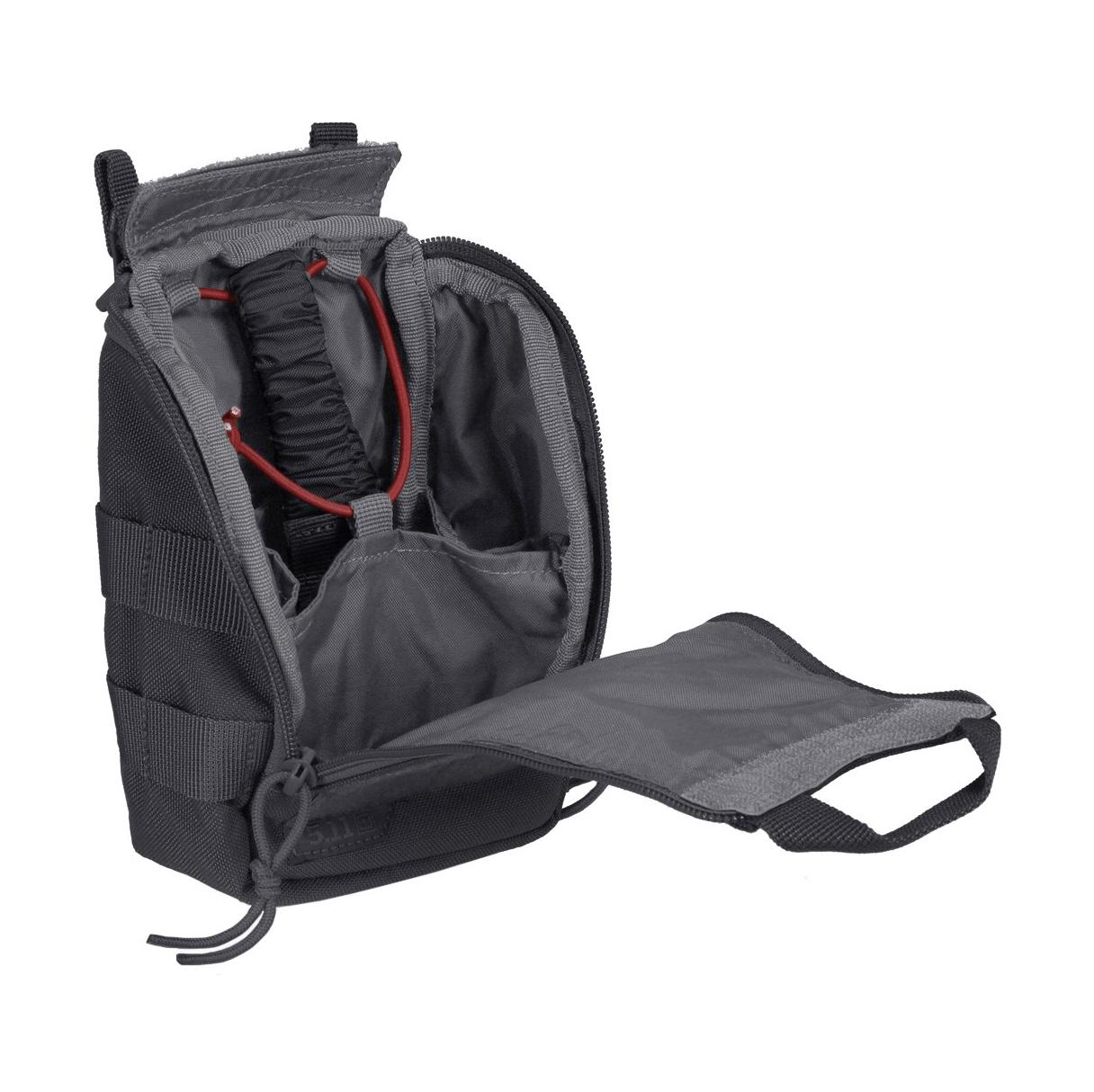 5.11 UCR IFAK Pouch, leer mit schwarzem Gewebe, geöffnetem Fach, sichtbar rotem Inhalt, Reißverschluss und verstärktem Boden.