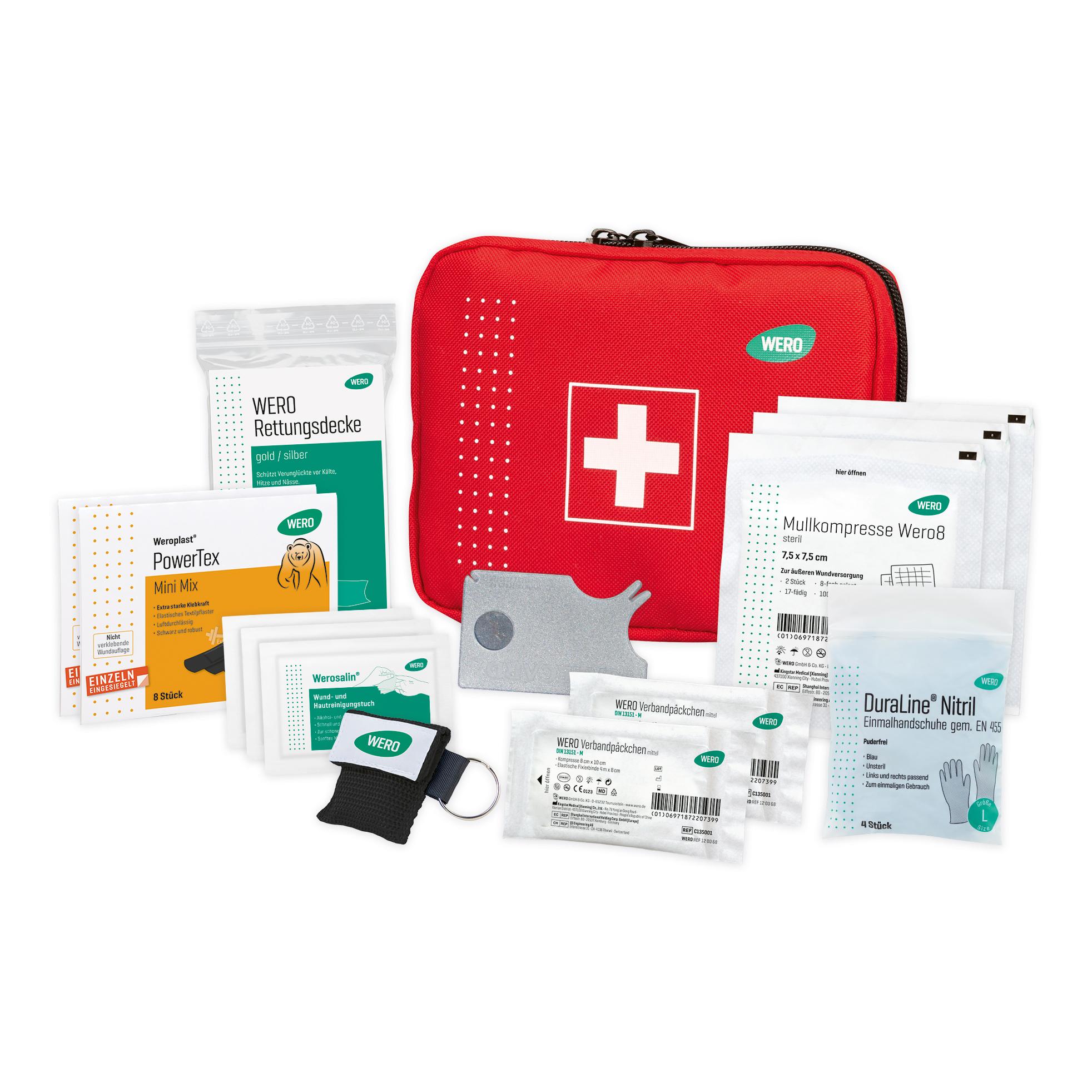 Offene WERO OutdoorWork Erste Hilfe Tasche mit weißem Kreuz, schwarzem Griff und verschiedenen Verbandsmaterialien, Pflastern und Handschuhen.