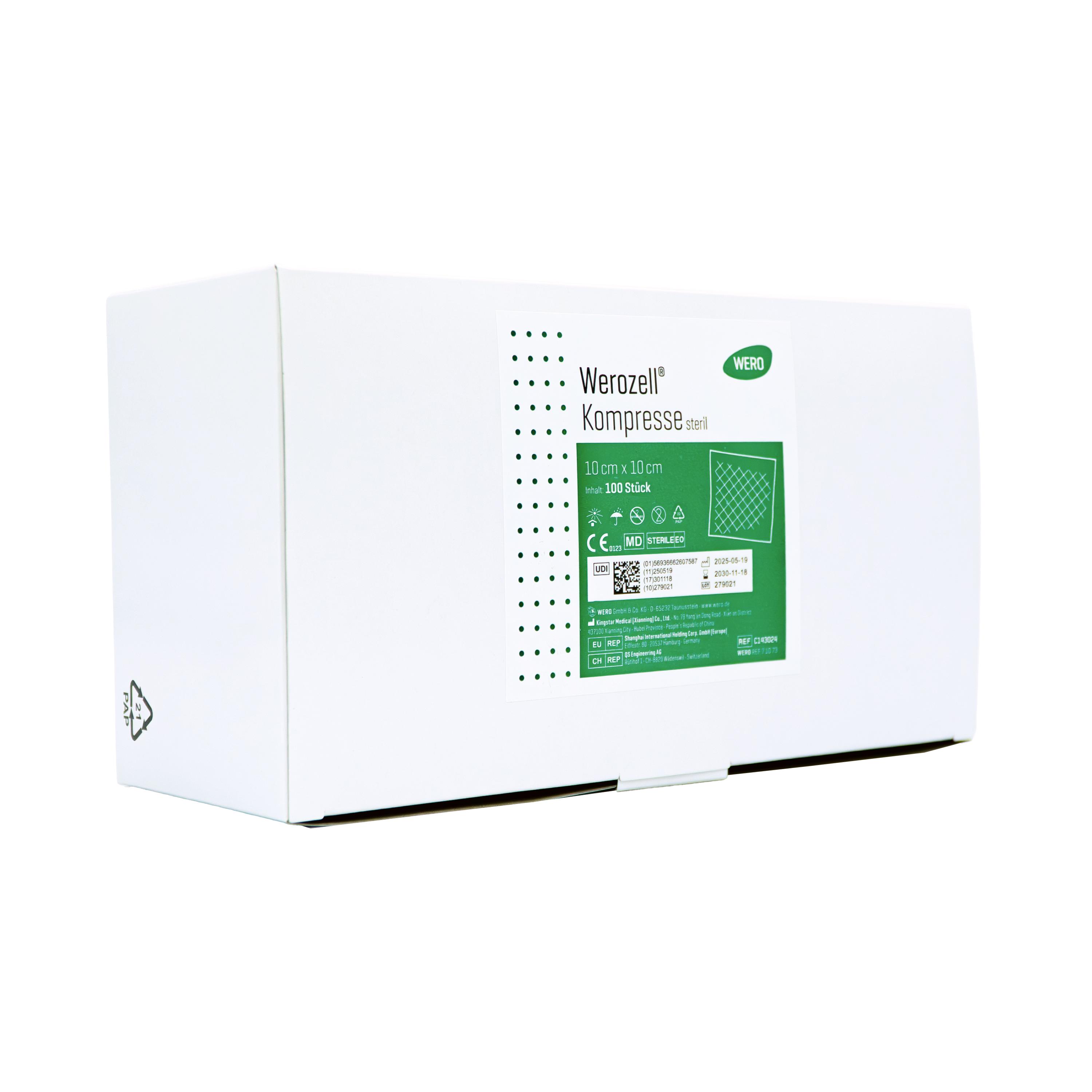 Eine rechteckige Box Werozell® Kompresse, steril - 100 Stk mit grünem Etikett, Maßangabe 10x10 cm, für sterile, beschichtete Vlieskompressen.