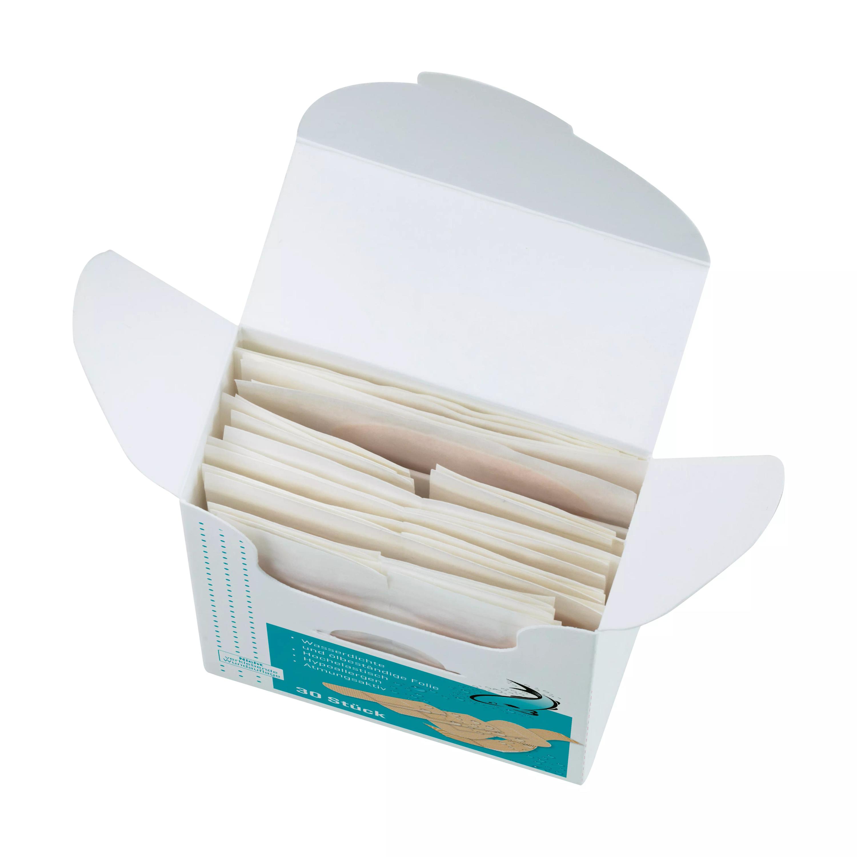 Eine offene Schachtel Weroplast® AquaFlex Pflaster - Mix DIN 13157 zeigt viele weiße Einzelpackungen, die wasserdicht sowie flexibel sind und Hautaufweichungen verhindern.