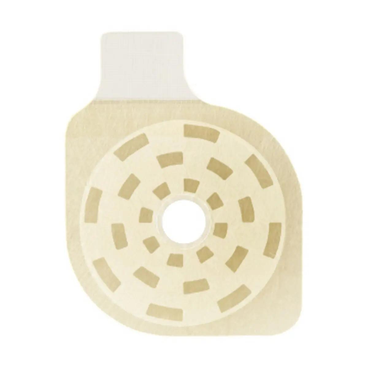 Foxseal™ Vented Chest Seal als beiges, rundes Thorax Pflaster mit zentralem Loch, gebogenem Arm und segmentiertem Rand aus Kunststoff.