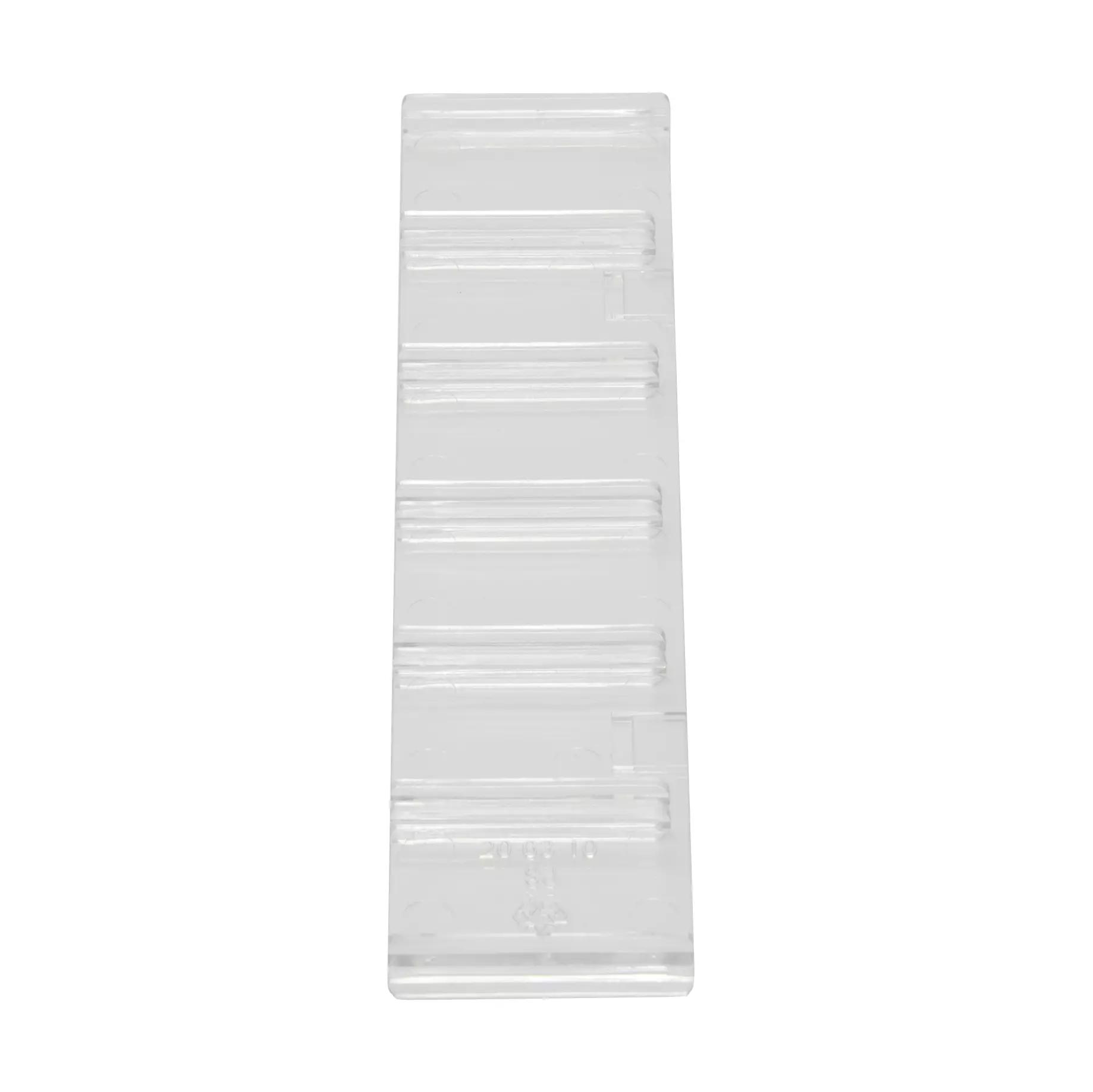 Eine transparente Trennwand, lang, für Werotop® 350 mit mehreren länglichen Rillen entlang der Oberfläche und seitlicher Vertiefung.