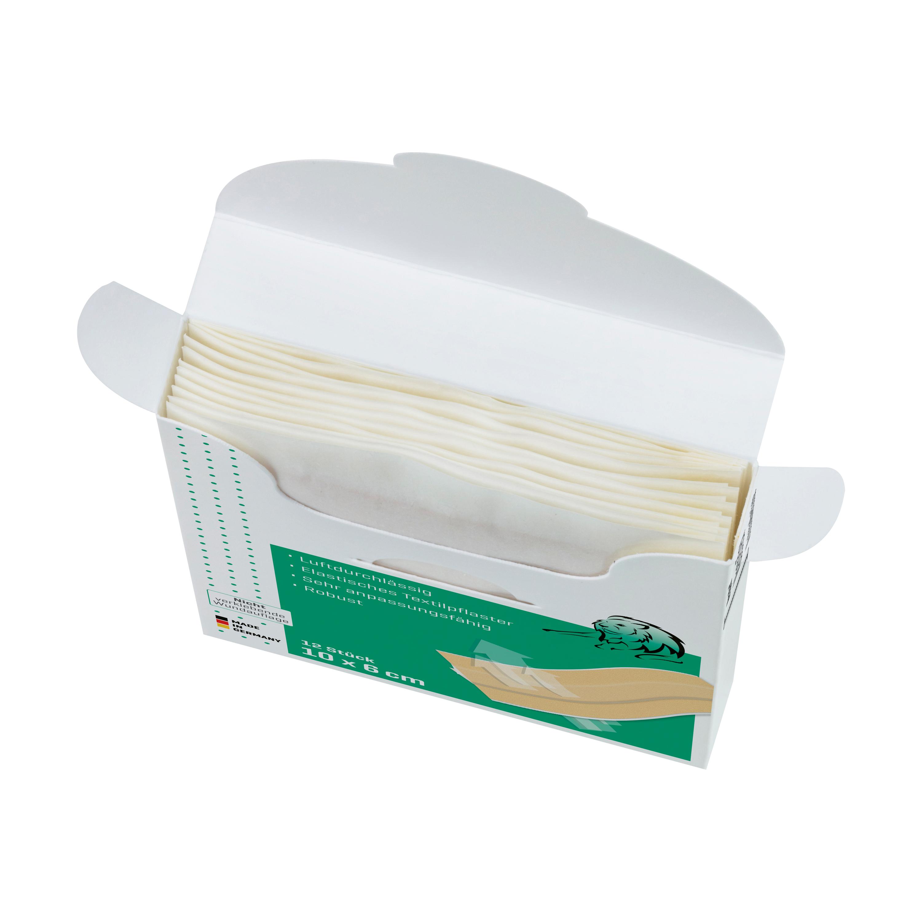 Eine geöffnete Box Pflasterset Weroplast® MasterTex - Wundschnellverbände DIN 13157 zeigt ordentlich gestapelte cremefarbene Wundschnellverbände aus textilem, anpassungsfähigem Gewebe.