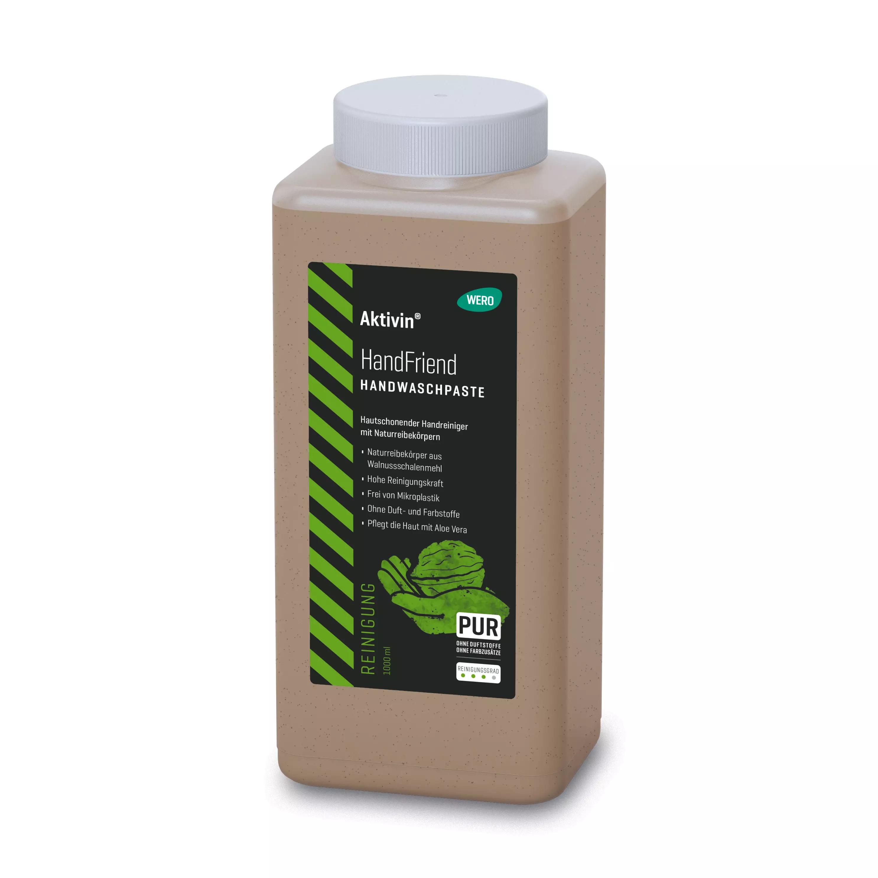 Ein beige Kunststoffbehälter Handwaschpaste Aktivin® HandFriend mit schwarzem Etikett und grünem Streifen, 1.000 ml, enthält Walnussschalenmehl und pflegende Rückfetter.
