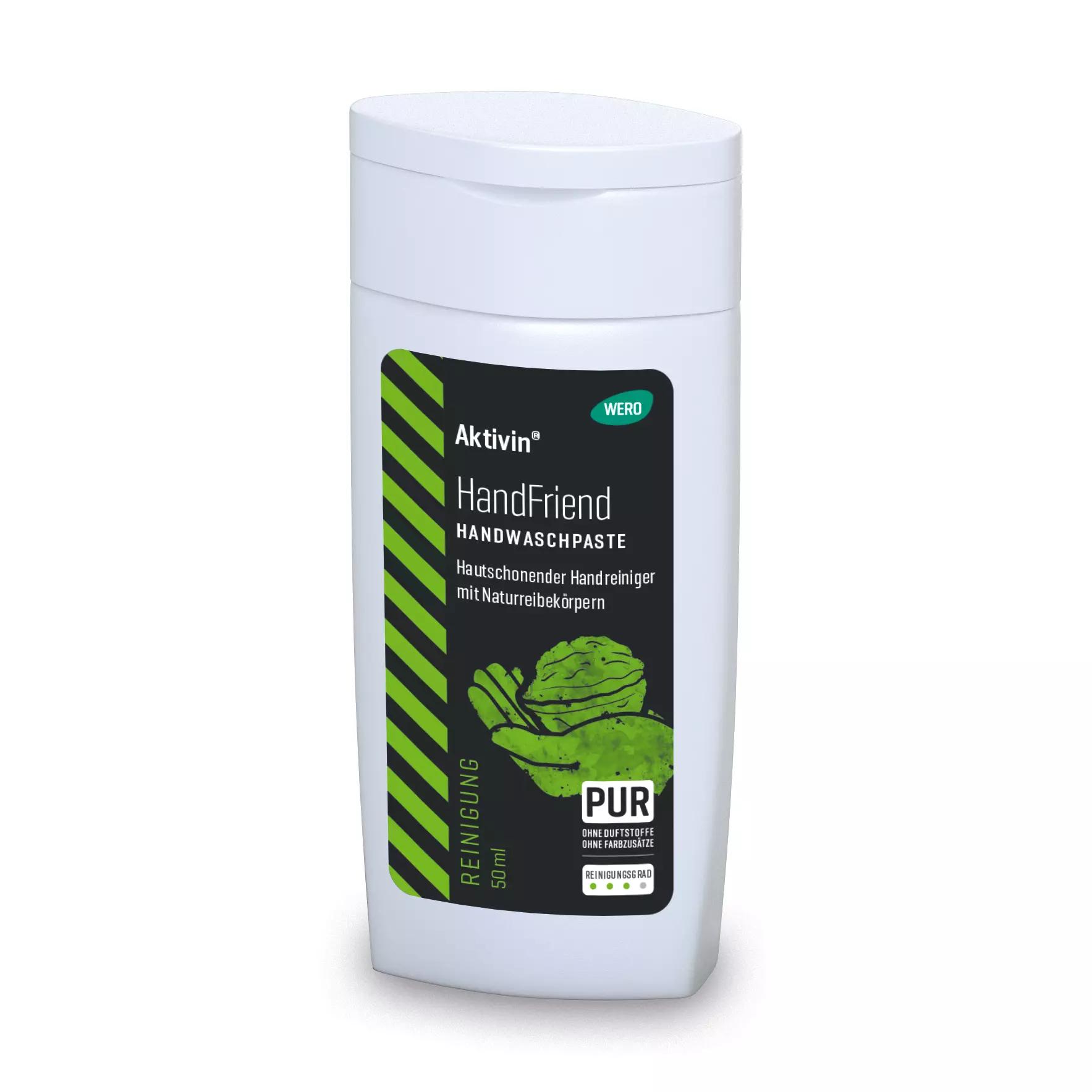 Weiße Plastikflasche Handwaschpaste Aktivin® HandFriend, 50 ml, mit grün-schwarzem Etikett und Walnussschalen als Naturreibekörper abgebildet.