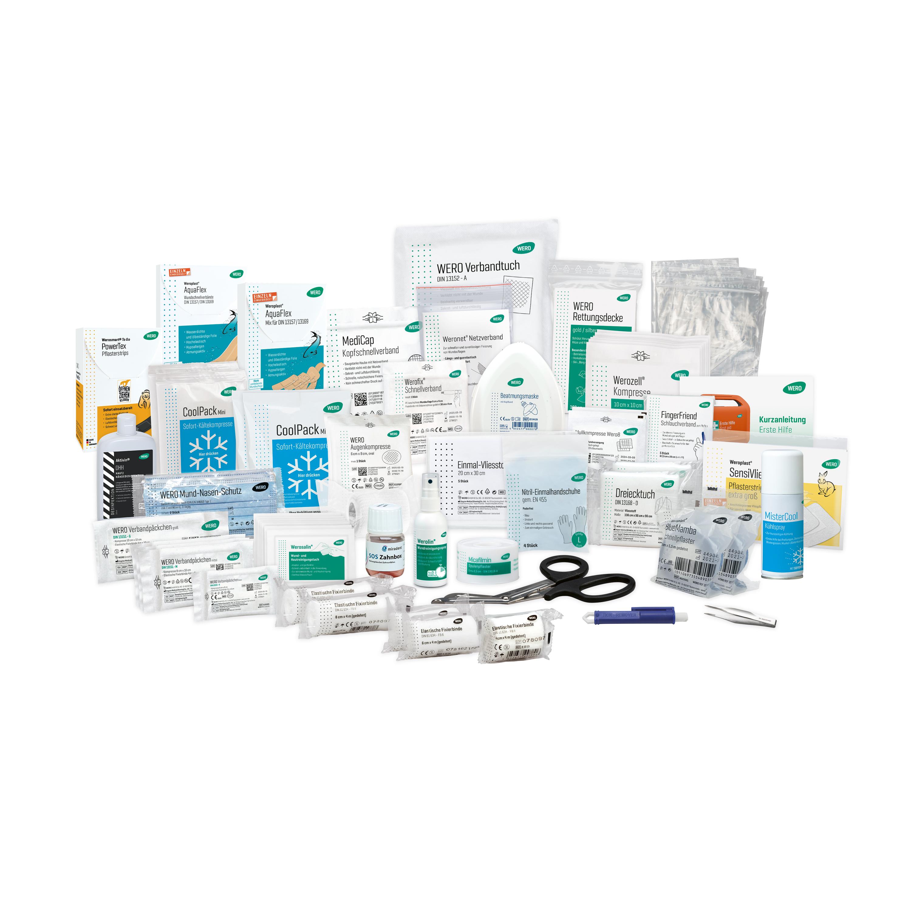 Füllung für Erste Hilfe Koffer Schule / KiTa mit übersichtlich angeordneten Verbänden, Pflastern, Desinfektion, Schere und weiteren Notfallartikeln.