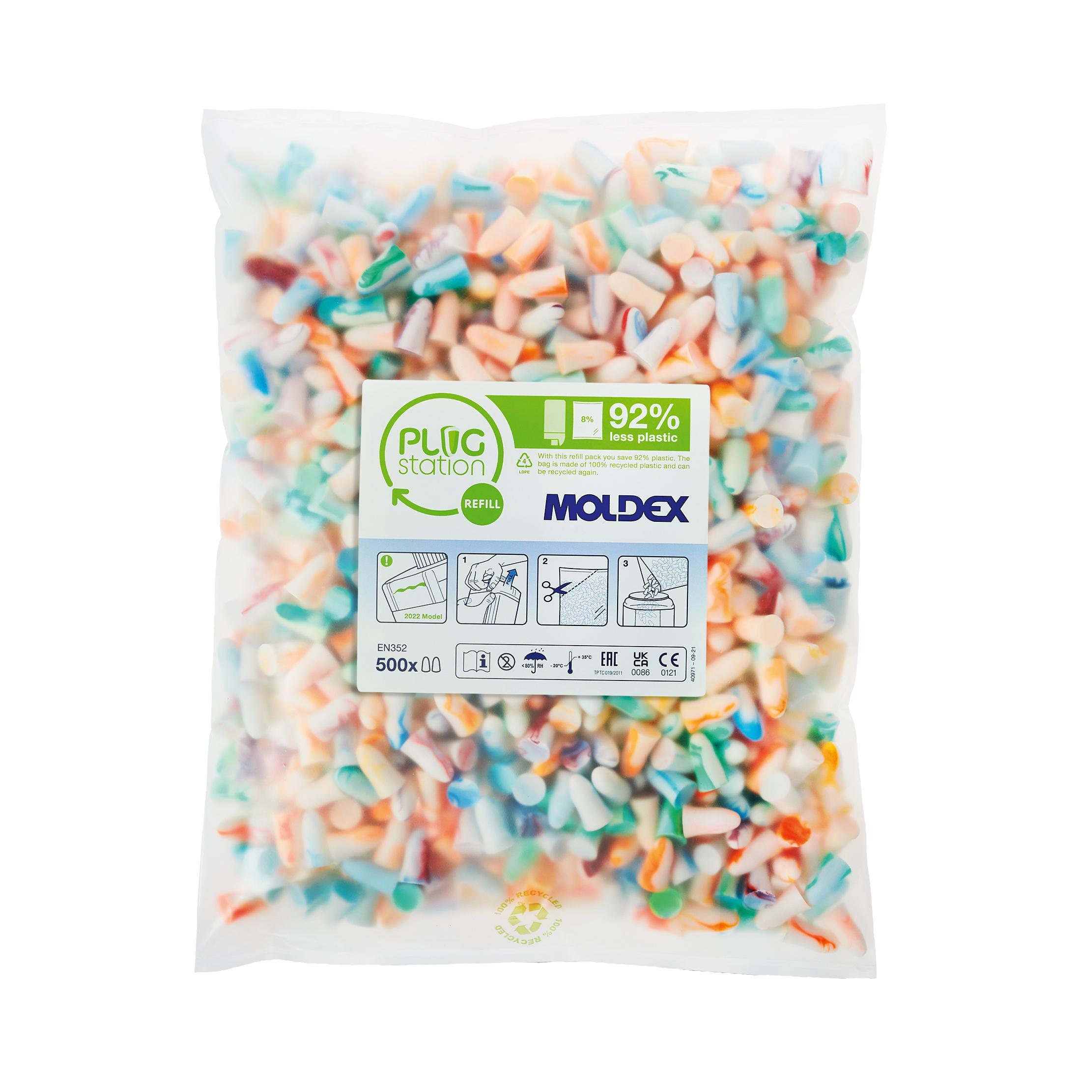 Ein transparenter Beutel mit 500 MOLDEX Spark Plugs Soft Gehörschutzstöpseln in Pastellfarben, grün-weißer Labelaufschrift und Anwendungshinweisen.