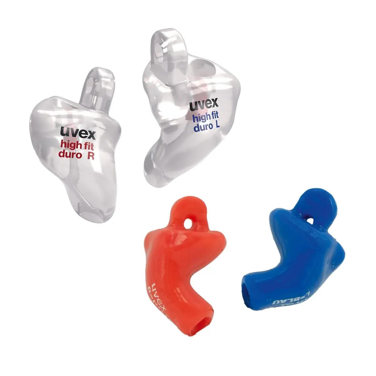 Drei uvex high-fit duro 32 detec Otoplastiken aus transparentem, robustem Duroplast, individuell geformt und mit ergonomischem Griffstück.