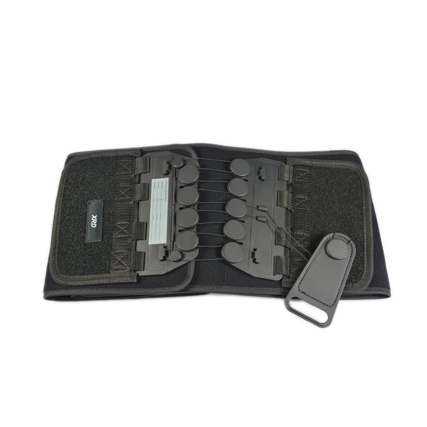 Schwarzer Arrow® T-POD™ Beckengurt mit zwei seitlichen Reißverschlusstaschen, gleichmäßigem Kompressionssystem und röntgendurchlässigem Etikett.