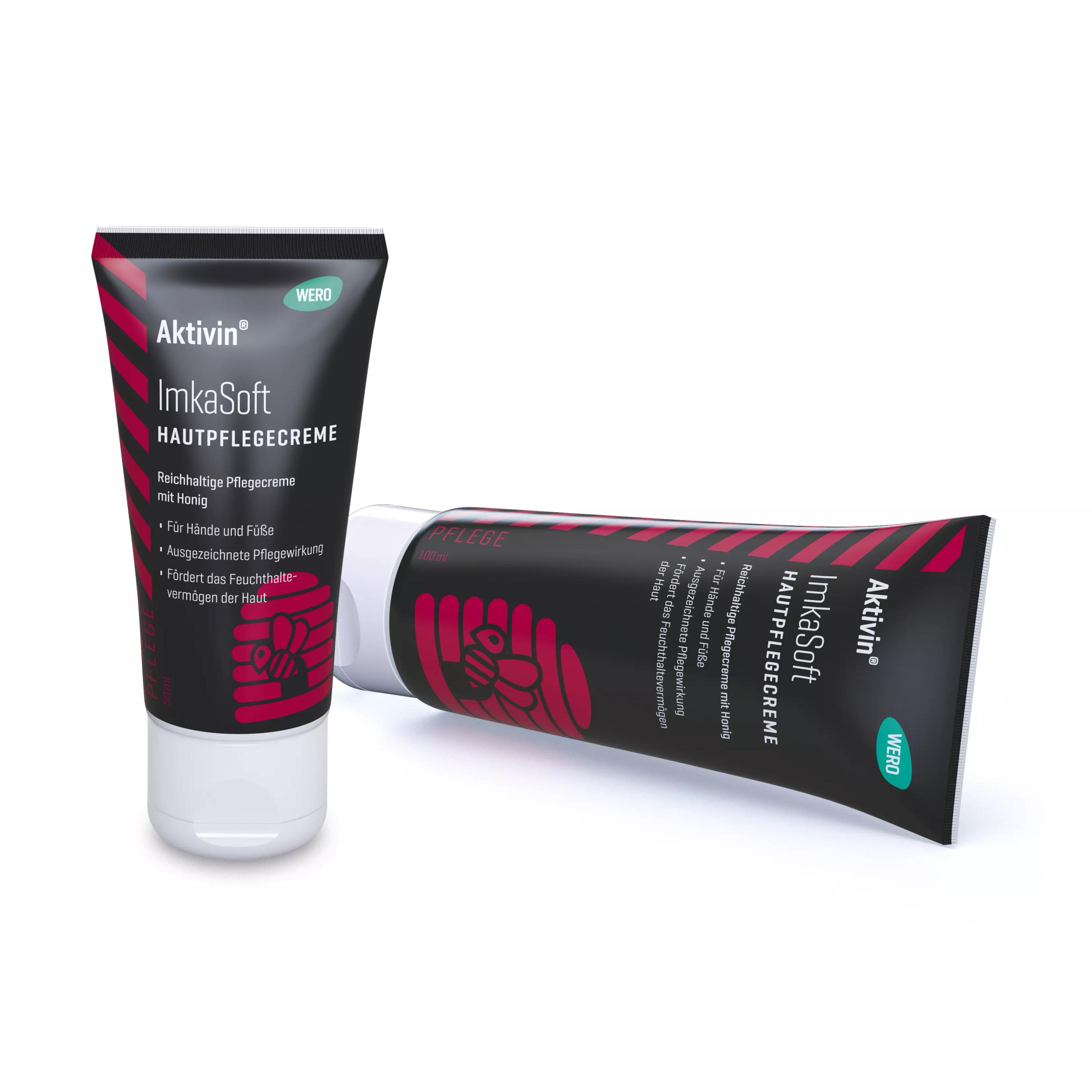 Zwei schwarze Tuben Hautpflegecreme Aktivin® ImkaSoft mit Honig, Urea und Glycerin, eine stehend, eine liegend, mit Bienenmotiv und rotem Akzent.