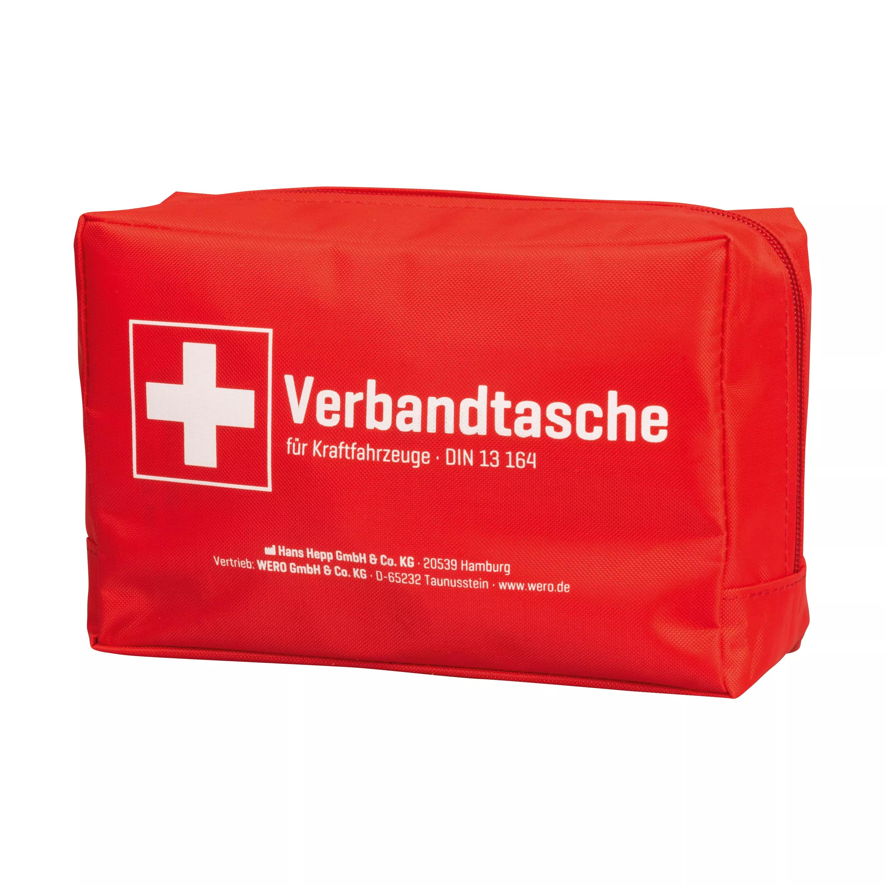 Eine rechteckige Verbandtasche Auto (KFZ) DIN 13164:2022-02 aus robustem Nylon mit weißem Kreuz, kompaktem Design und deutlich lesbarer Beschriftung.