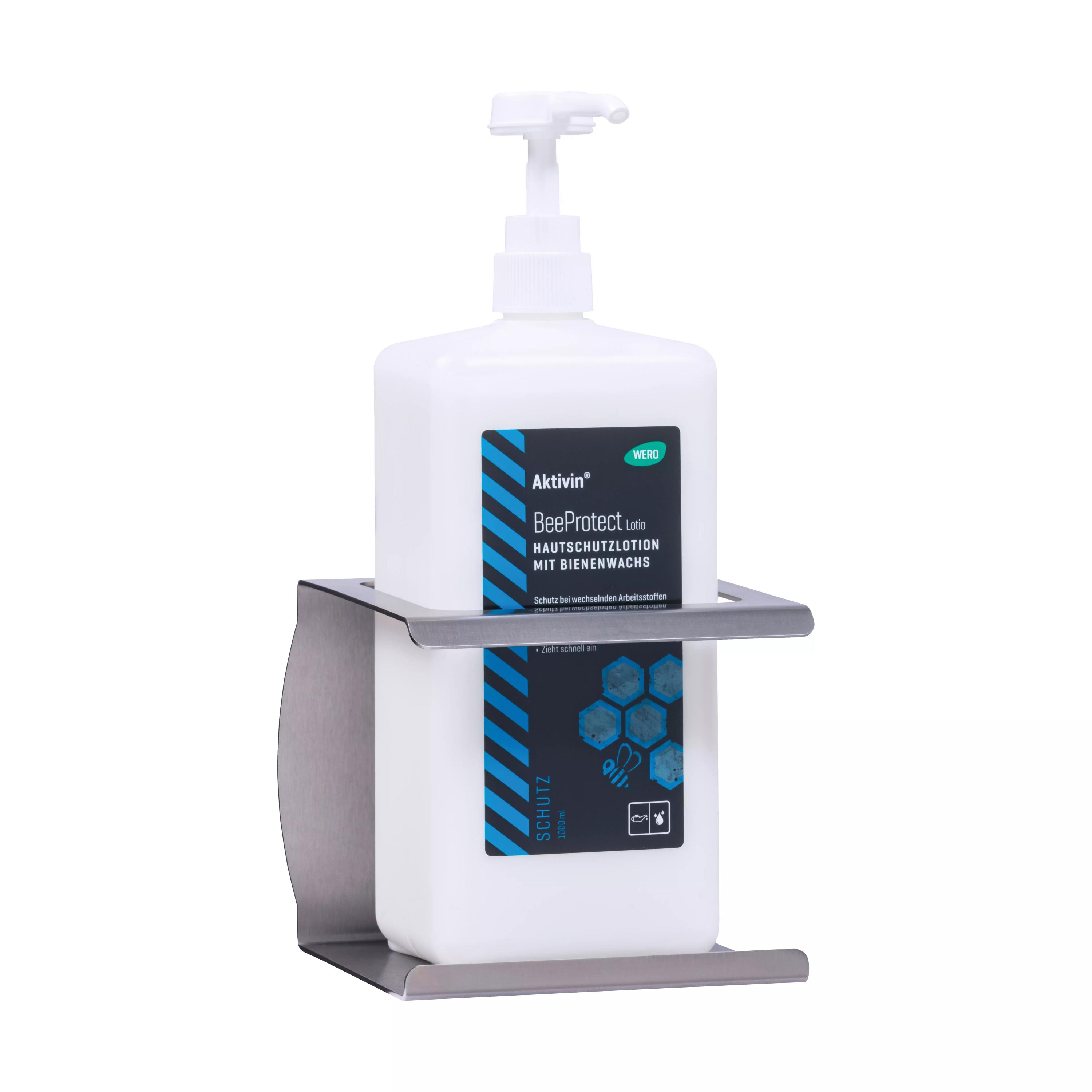 Der Wandhalter für Euroflaschen - 2.500 ml aus Metall hält eine große weiße Flasche senkrecht und ist für vielseitige Anwendungen geeignet.