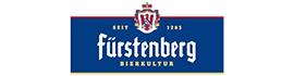 Fürstenberg 1893 Birkenluter Logo mit weißem Schild, rotem Emblem und weißer Serifenschrift.