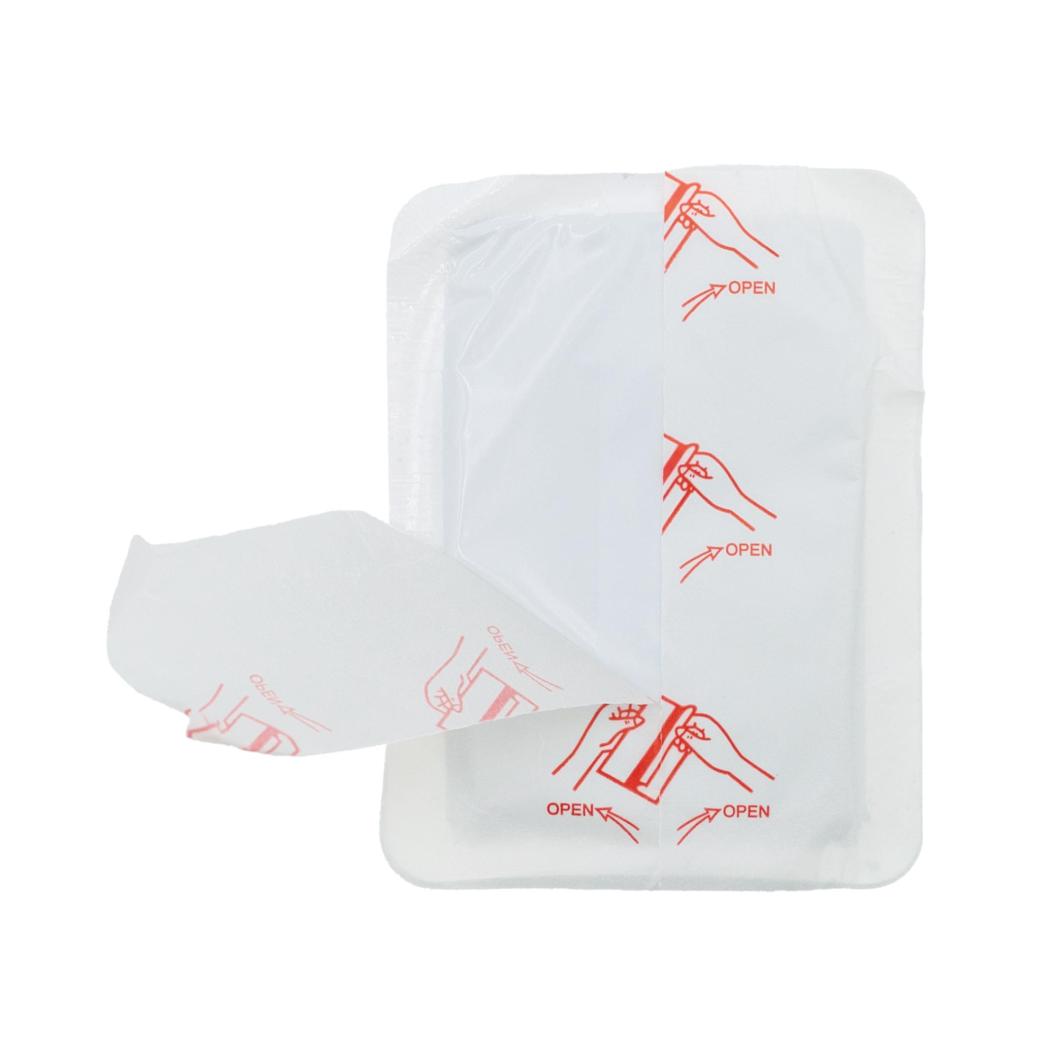 Weiße Verpackung des FIGO® Wärmekissen - Standard mit roten Anweisungen, geöffnet und rote Diagramme sowie Texte im Inneren sichtbar.