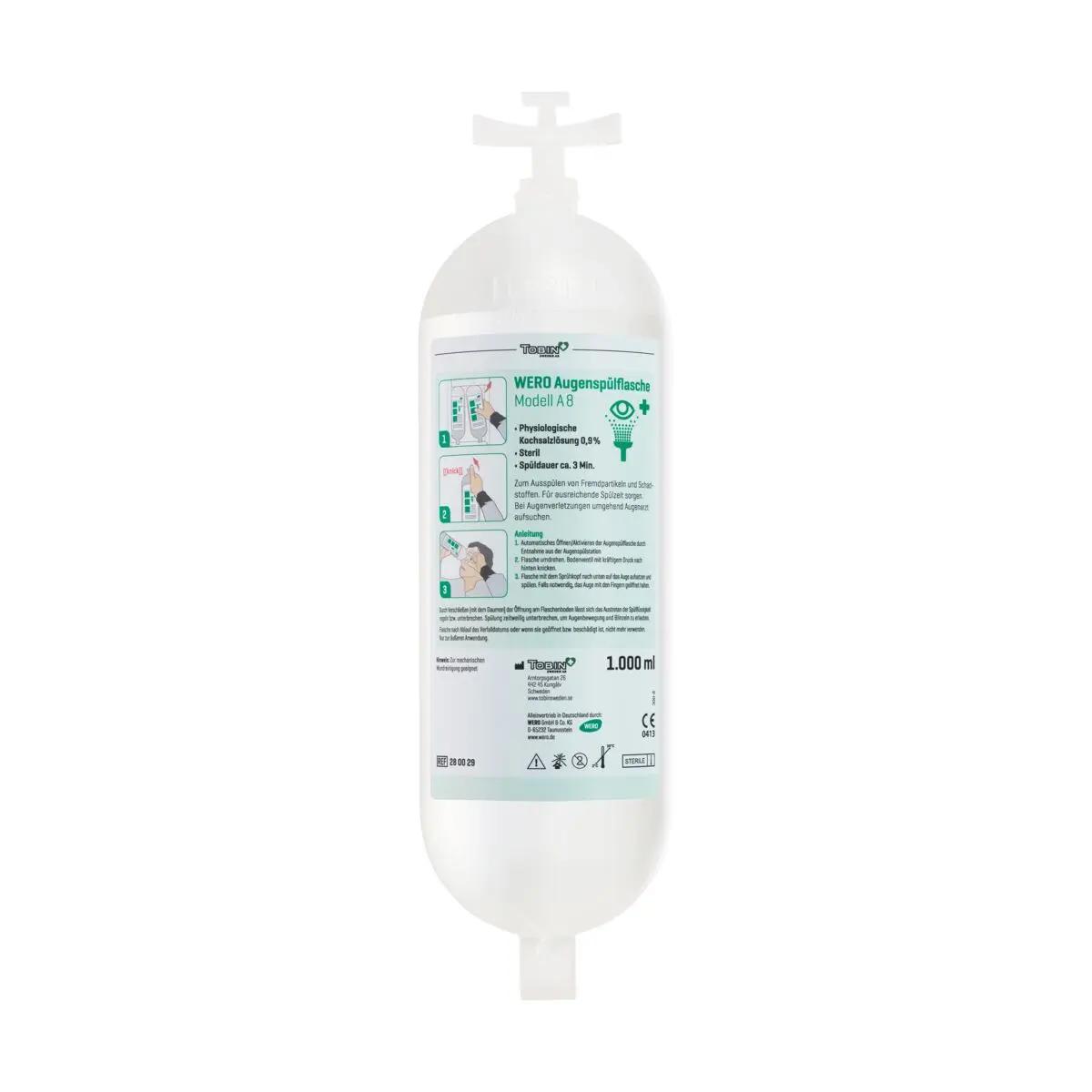 Ein weißer, 1.000 mL WERO Augenspülflasche Modell A8 Behälter mit Klappdeckel, grüner Beschriftung und Anwendungshinweisen auf dem Etikett steht frontal.