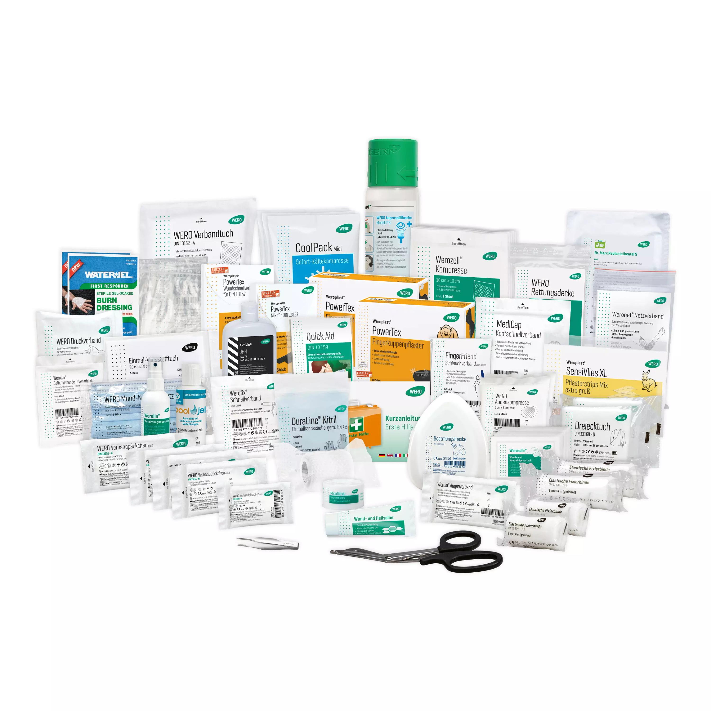 Eine umfangreiche Füllung für Erste Hilfe Koffer Werkstatt / Instandhaltung, bestehend aus Pflastern, Verbänden, Desinfektionsmittel, Schmerztabletten und Scheren.