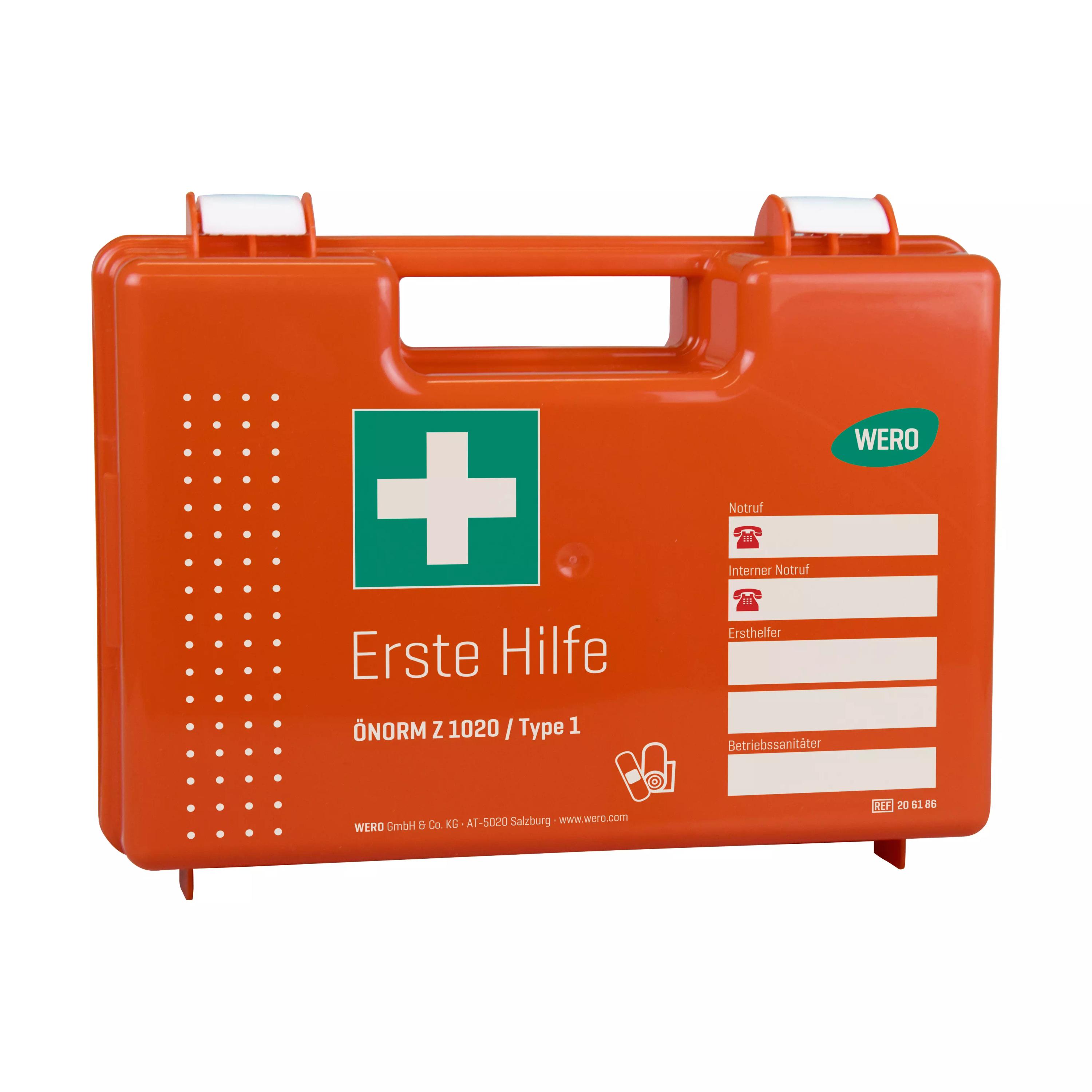Orangefarbener Erste Hilfe Koffer mit WERO Basis Füllung ÖNORM Z 1020 Typ 1, grünem Kreuz und stabilem Griff oben.