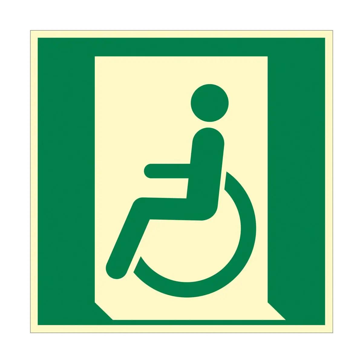 Grünes Rettungszeichen - Notausgang für nicht gehfähige oder gehbeeinträchtigte Personen - links mit Rollstuhlsymbol in beleuchtetem Design.