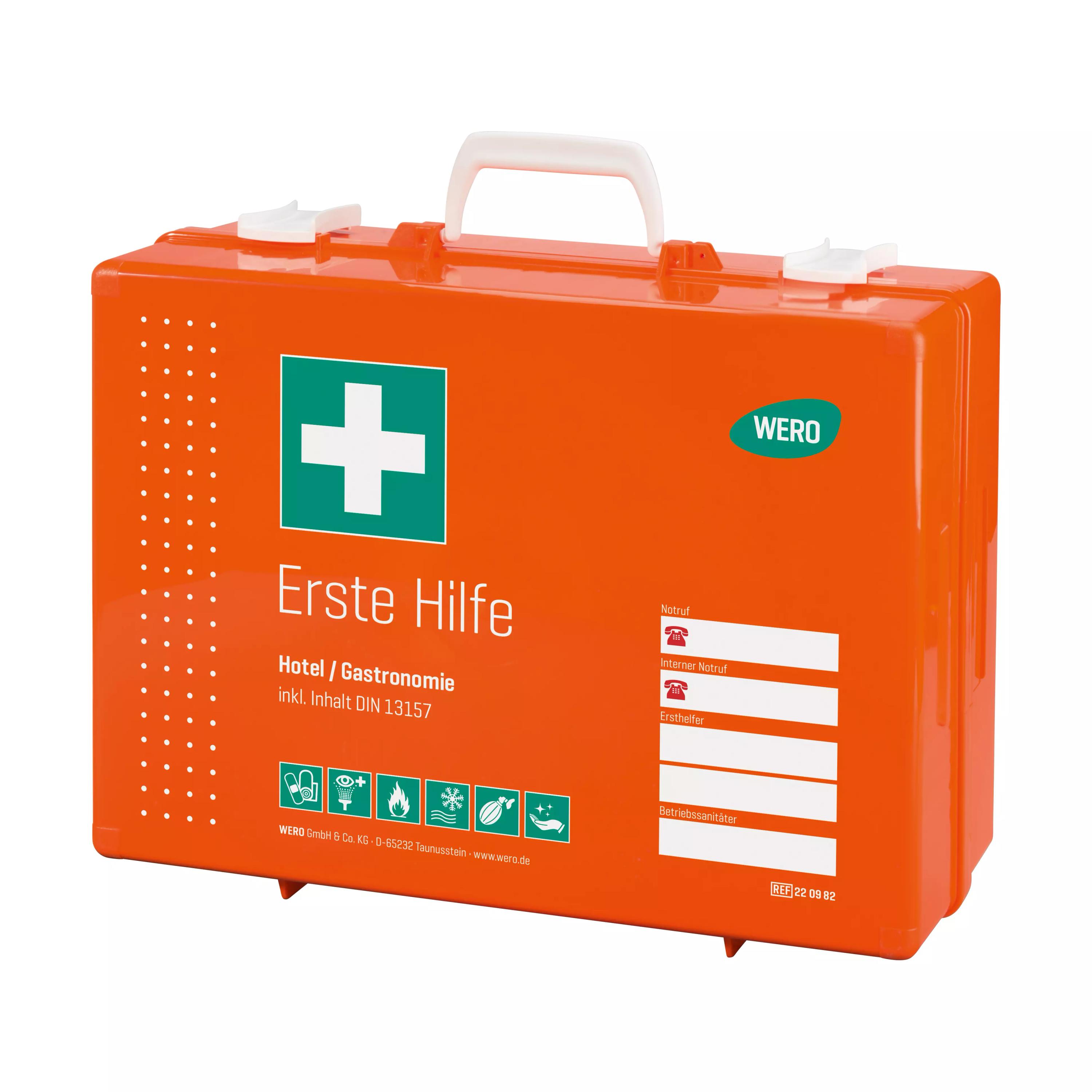 Ein orangefarbener Werotop® 450 Erste Hilfe Koffer Gastronomie / Hotel DIN 13157 aus robustem Kunststoff mit Griff, ausgestelltem grünen Kreuz und DIN-Label.