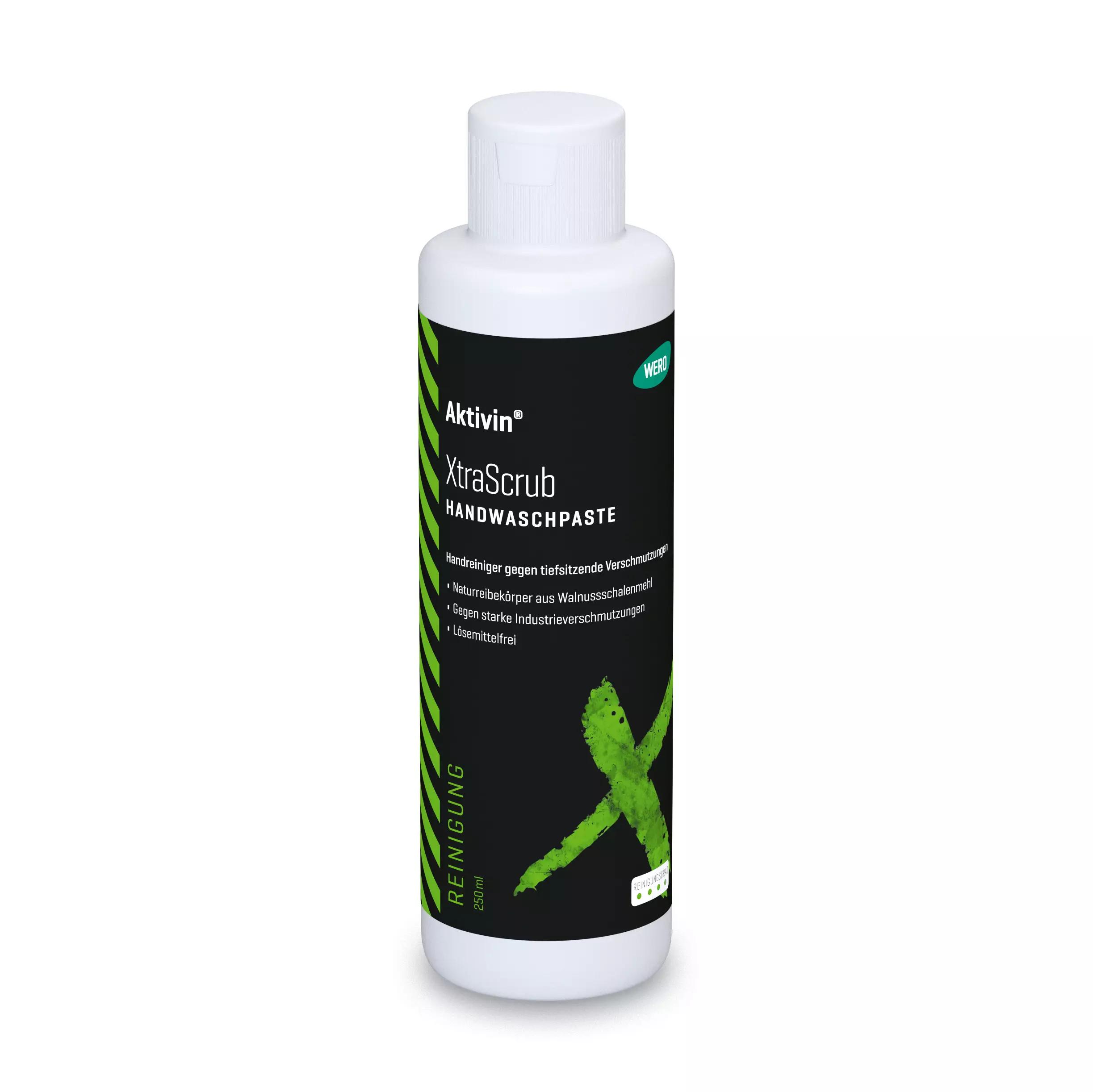 Stehende Flasche Hautreinigung Aktivin® XtraScrub, 250 ml, mit grünem Etikett, Walnussschalen-Reibekörpern und rückfettenden Inhaltsstoffen.