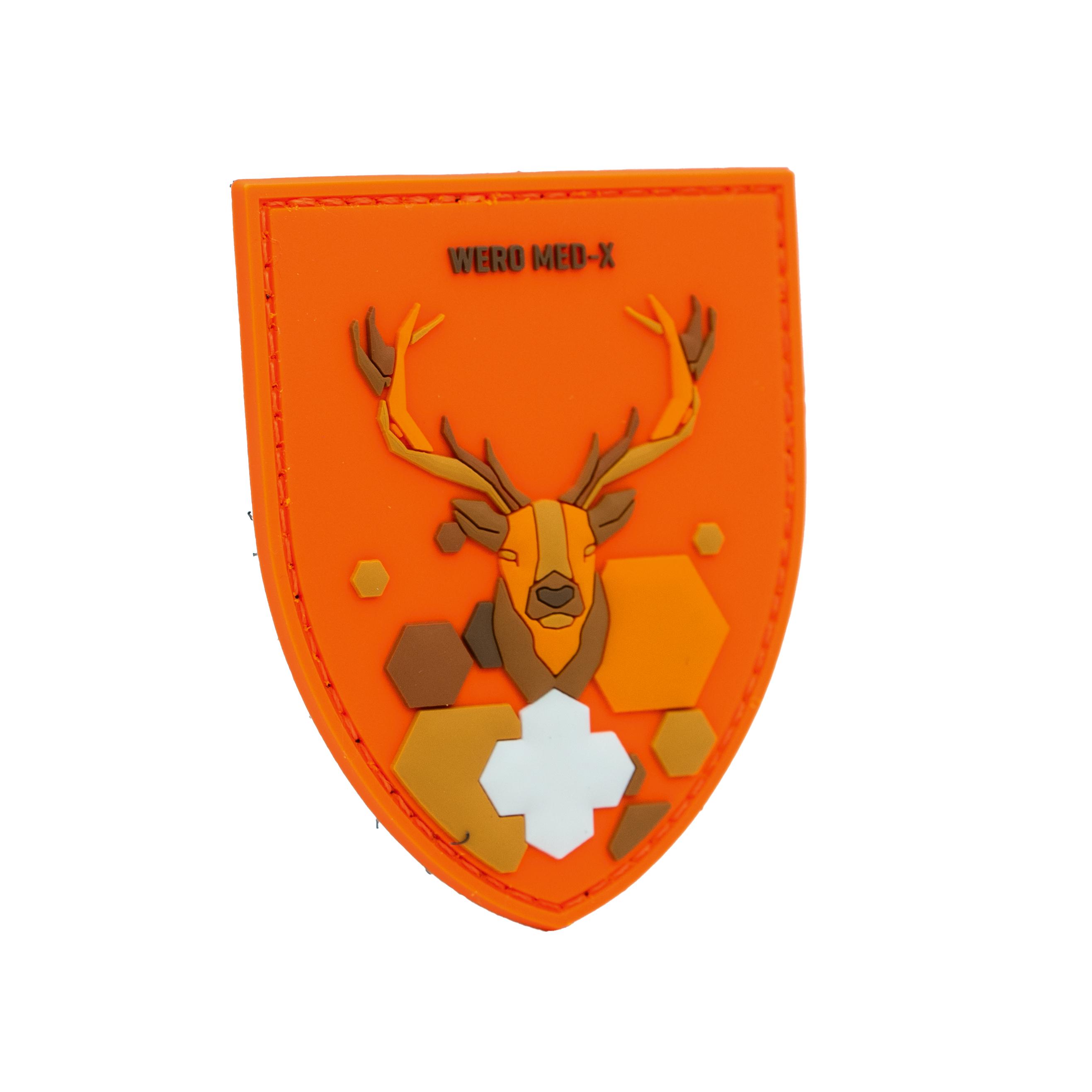 Oranger Patch WERO MED-X® Hunter Medic Pack mit Hirschkopf, weißen Antlern, geometrischen Mustern, medizinischem Kreuz und Aufschrift oben.
