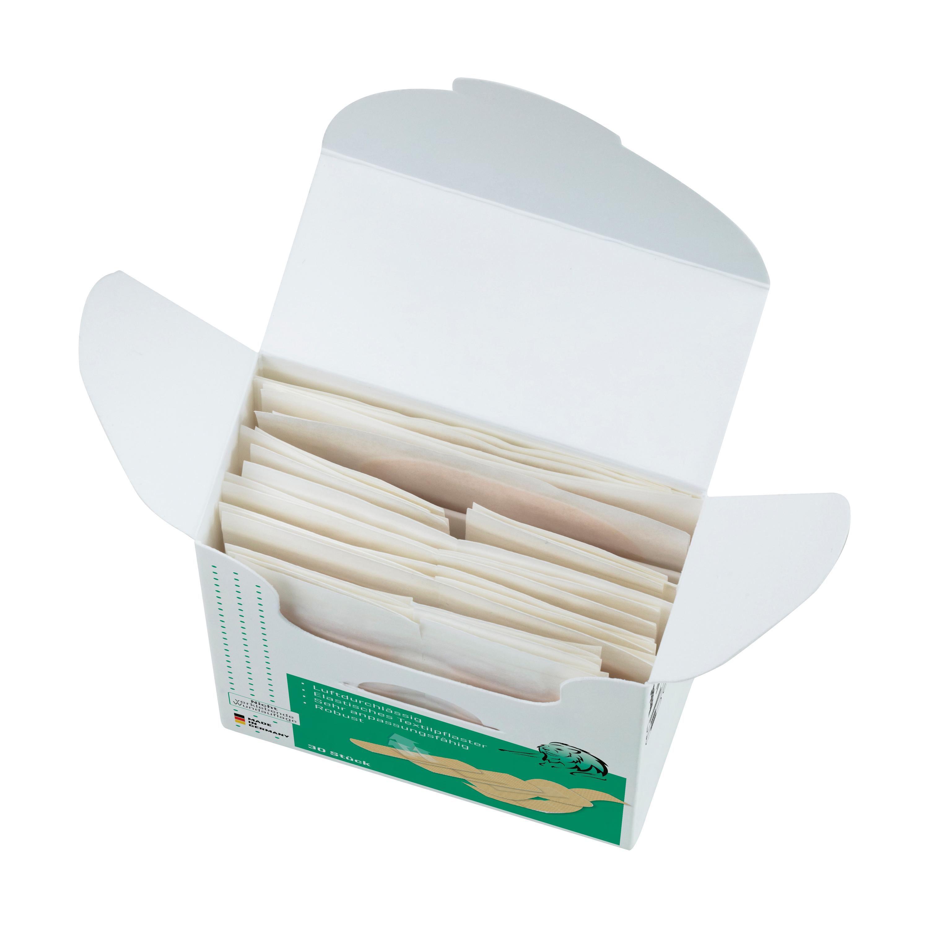 Eine geöffnete Box Pflasterset Weroplast® MasterTex - Mix DIN 13157 zeigt viele einzeln verpackte Pflaster aus anpassungsfähigem, textilem Gewebe.