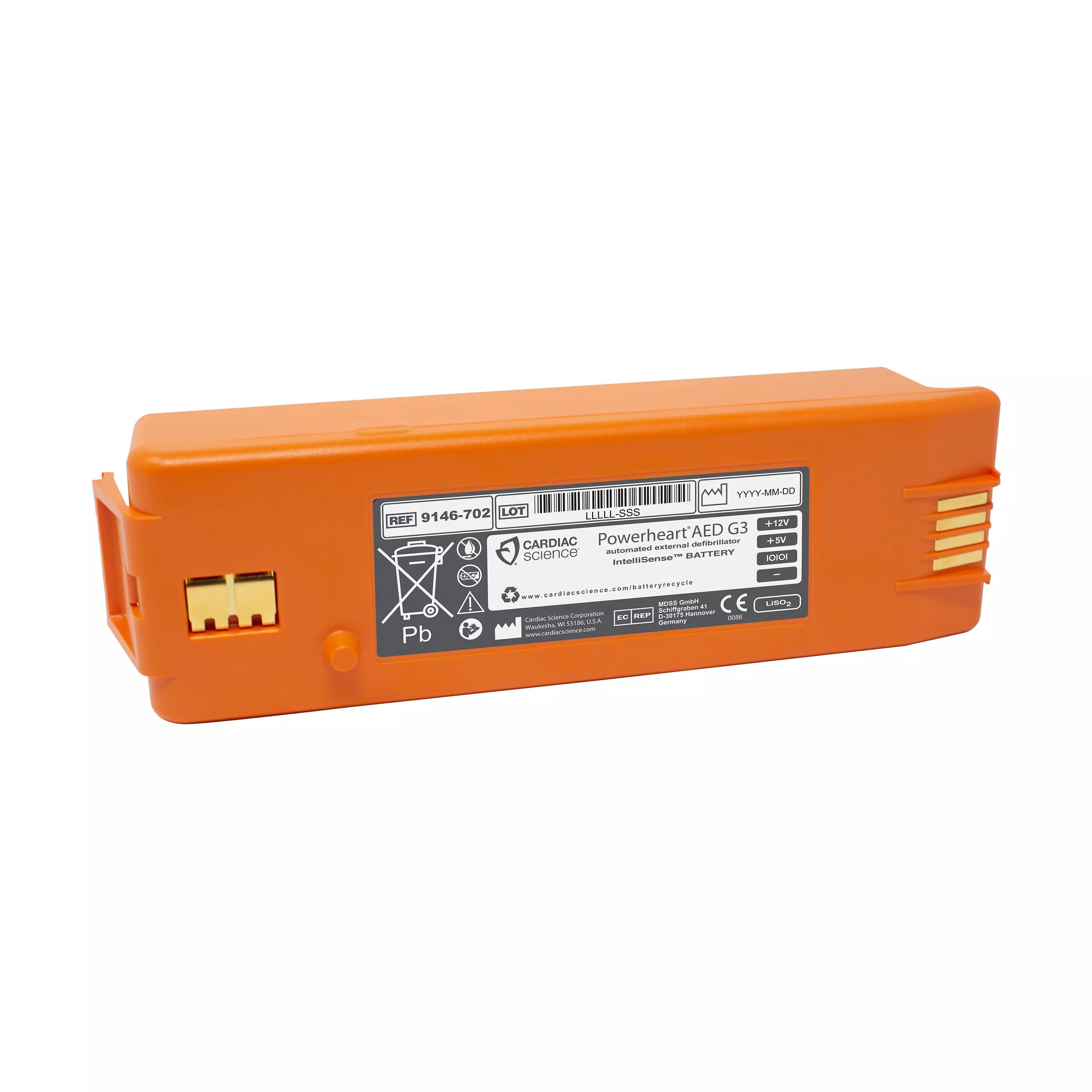 Orangefarbene Lithium Batterie für AED Cardiac Science/ZOLL PowerHeart AED G3 mit rechteckigem Gehäuse, gelben Kontakttabs und schwarzer Beschriftung.