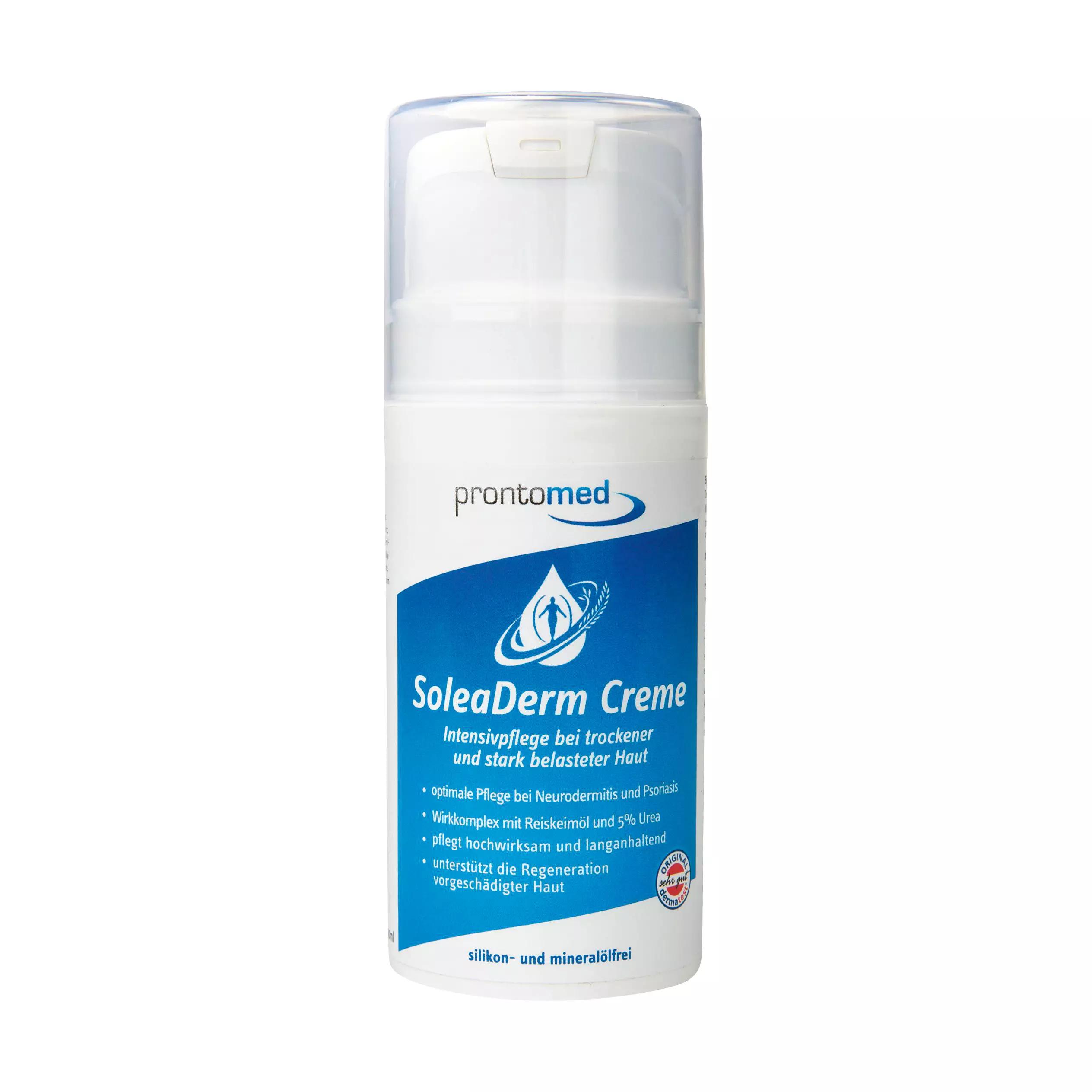 Eine weiße Flasche SoleaDerm Creme mit Klappdeckel zeigt ein Etikett mit Hand-und-Tropfen-Design sowie Hinweisen auf 5 % Urea und Reiskeimöl.