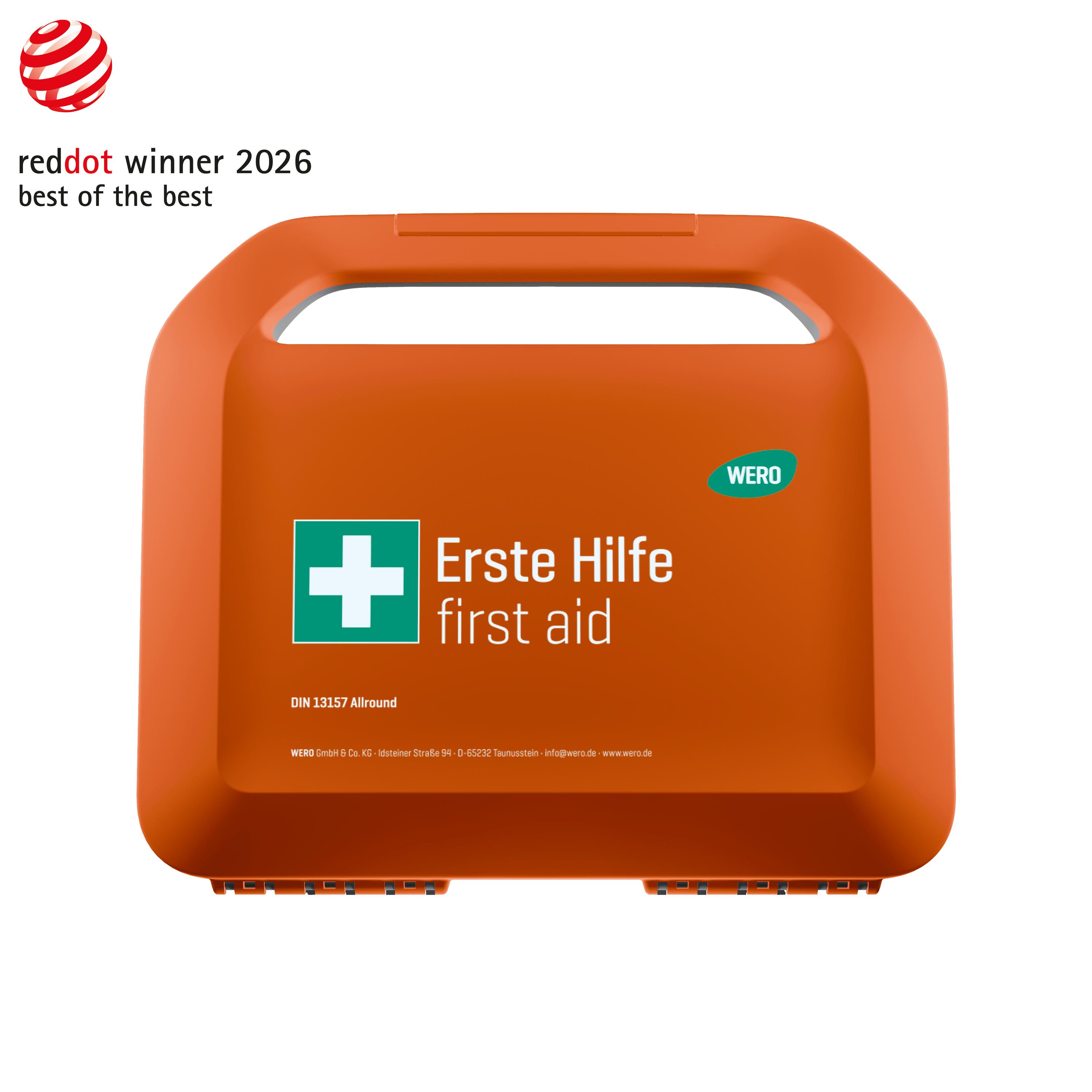 Orangefarbener Erste-Hilfe-Koffer mit Tragegriff, weißem Kreuz-Symbol, Aufschrift „Erste Hilfe first aid DIN 13157 Allround“ und WERO-Logo.