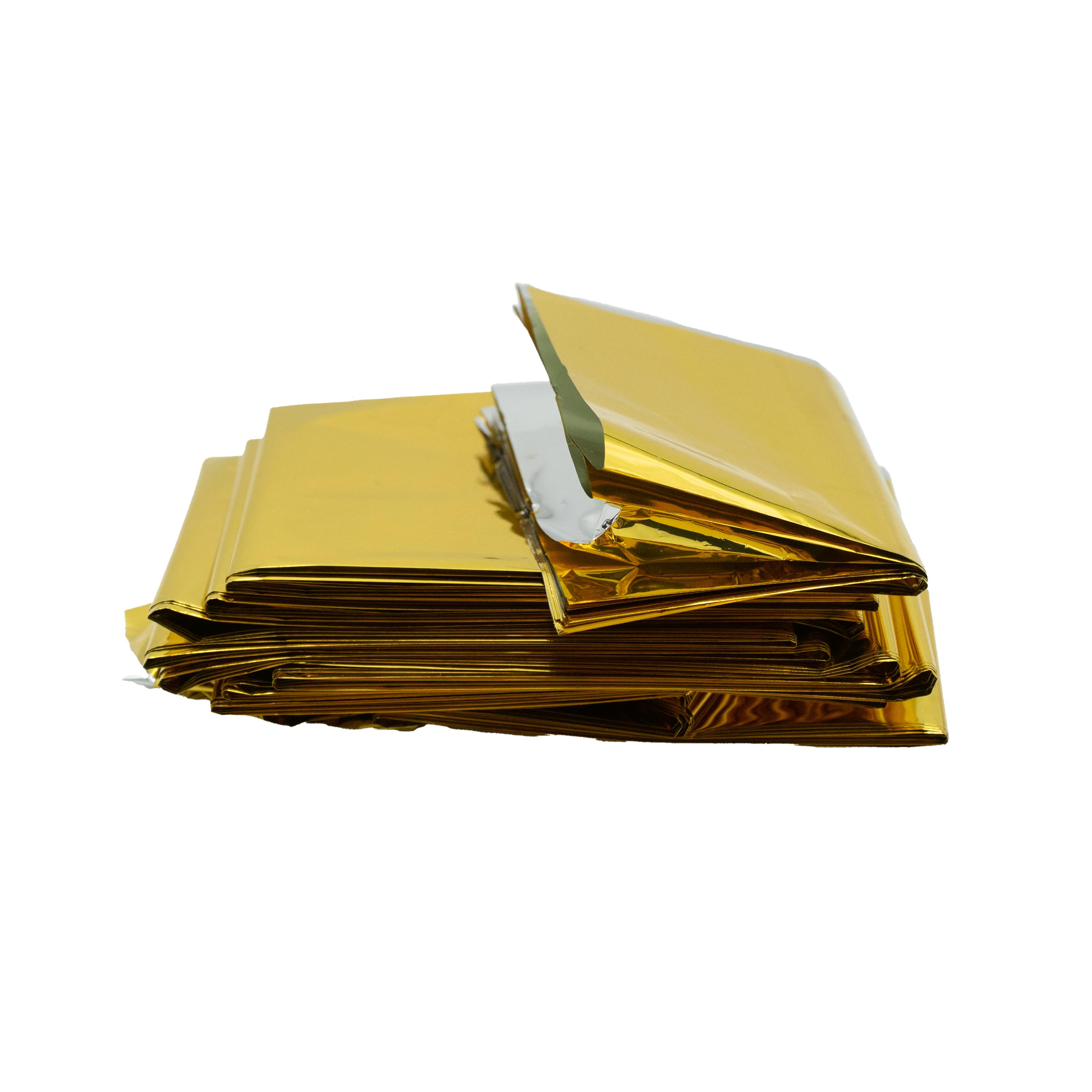 Alt-Text: Mehrere übereinanderliegende WERO Rettungsdecke Folien, gold glänzend, eine davon teilweise umgeklappt und zeigt die weiße Rückseite.