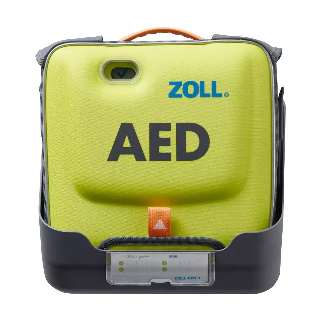 Das ZOLL AED 3 Wandhalterung zeigt einen gelben Defibrillator mit oranger Trageschlaufe, schwarzem Clip und auffälligem AED-Schriftzug.