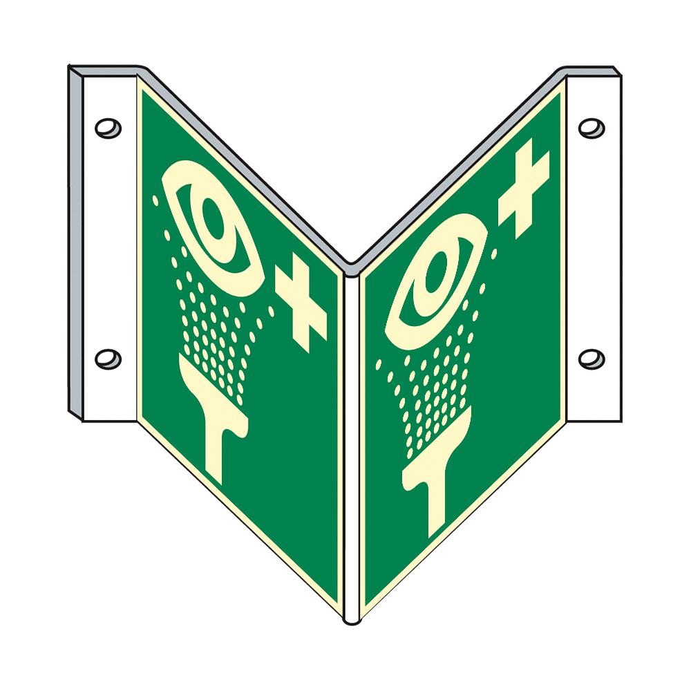 Grünes Rettungszeichen - Augenspüleinrichtung - Winkel, zeigt zwei stilisierte Augen mit Wasserstrahlen und Kreuz, an weißer Wand befestigt.