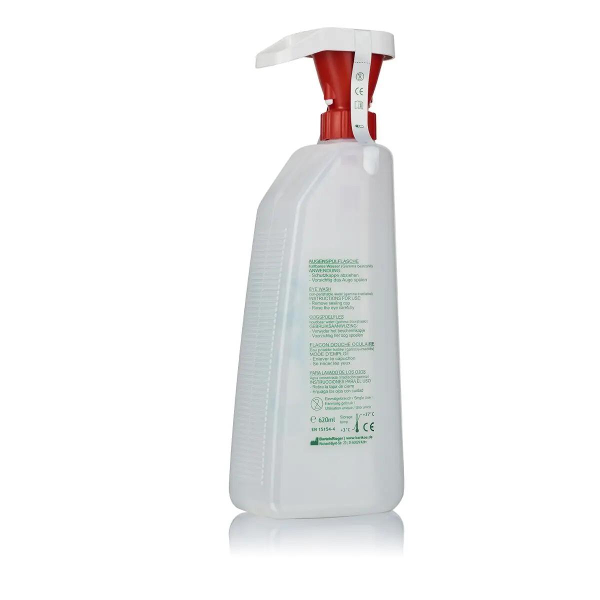 Transparente Augenspülflasche Barikos KS, 620 ml mit rotem Sprühkopf und französisch beschriftetem Etikett mit Sicherheitshinweisen.