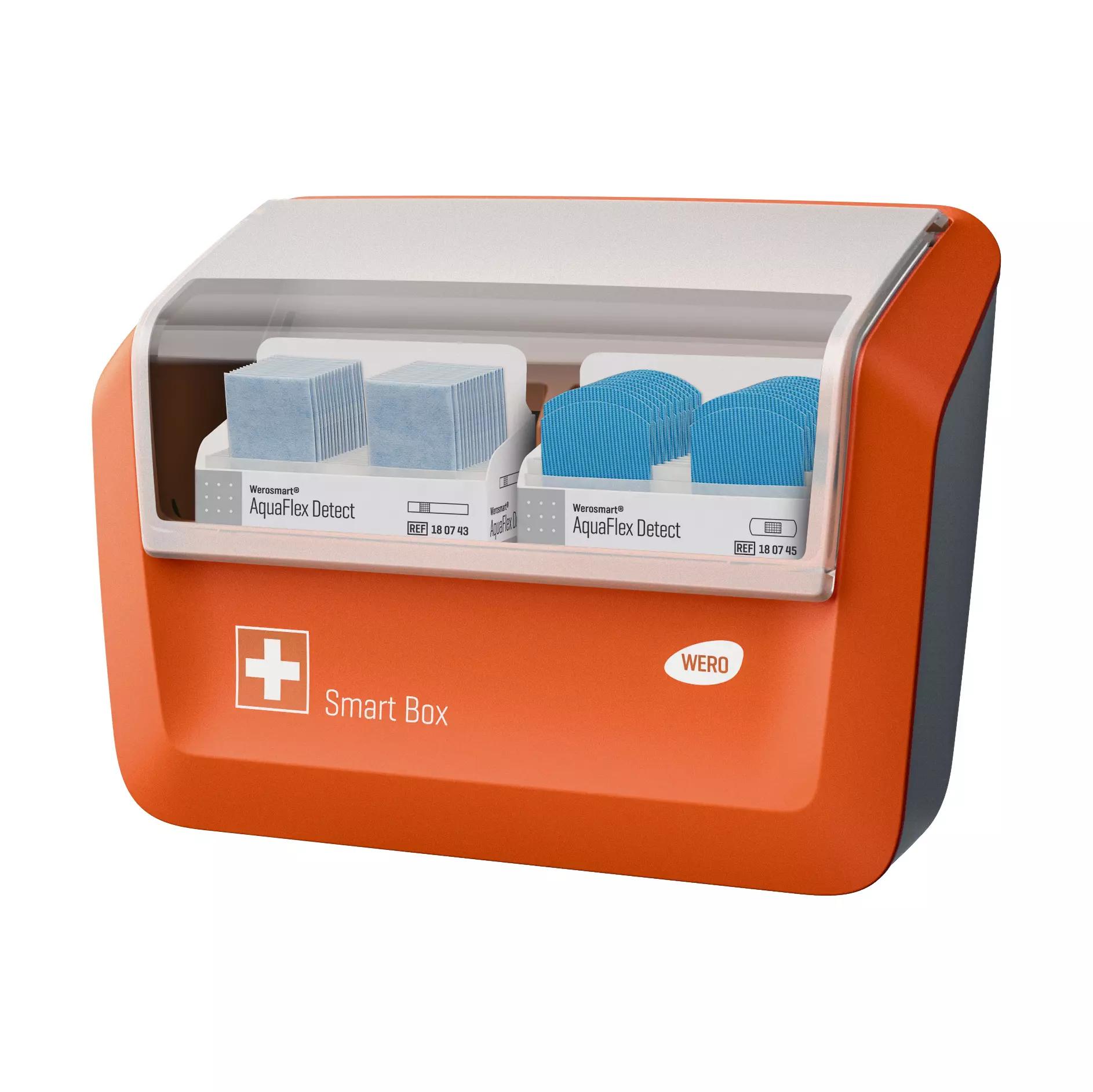 Offene WERO Smart Box mit zwei Fächern, jeweils gefüllt mit mehreren blauen AquaFlex Detect Discs und transparentem Deckel.