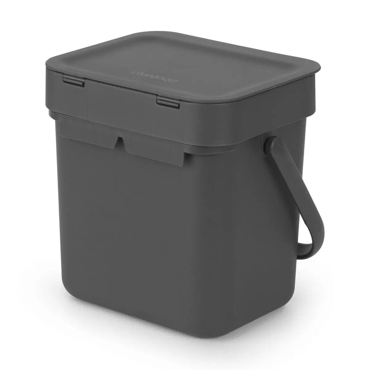 Abfallbehälter 3 Liter aus schwarzem Kunststoff mit rechteckiger Form und aufklappbarem Deckel, seitlichem Griff und schlichtem Design.