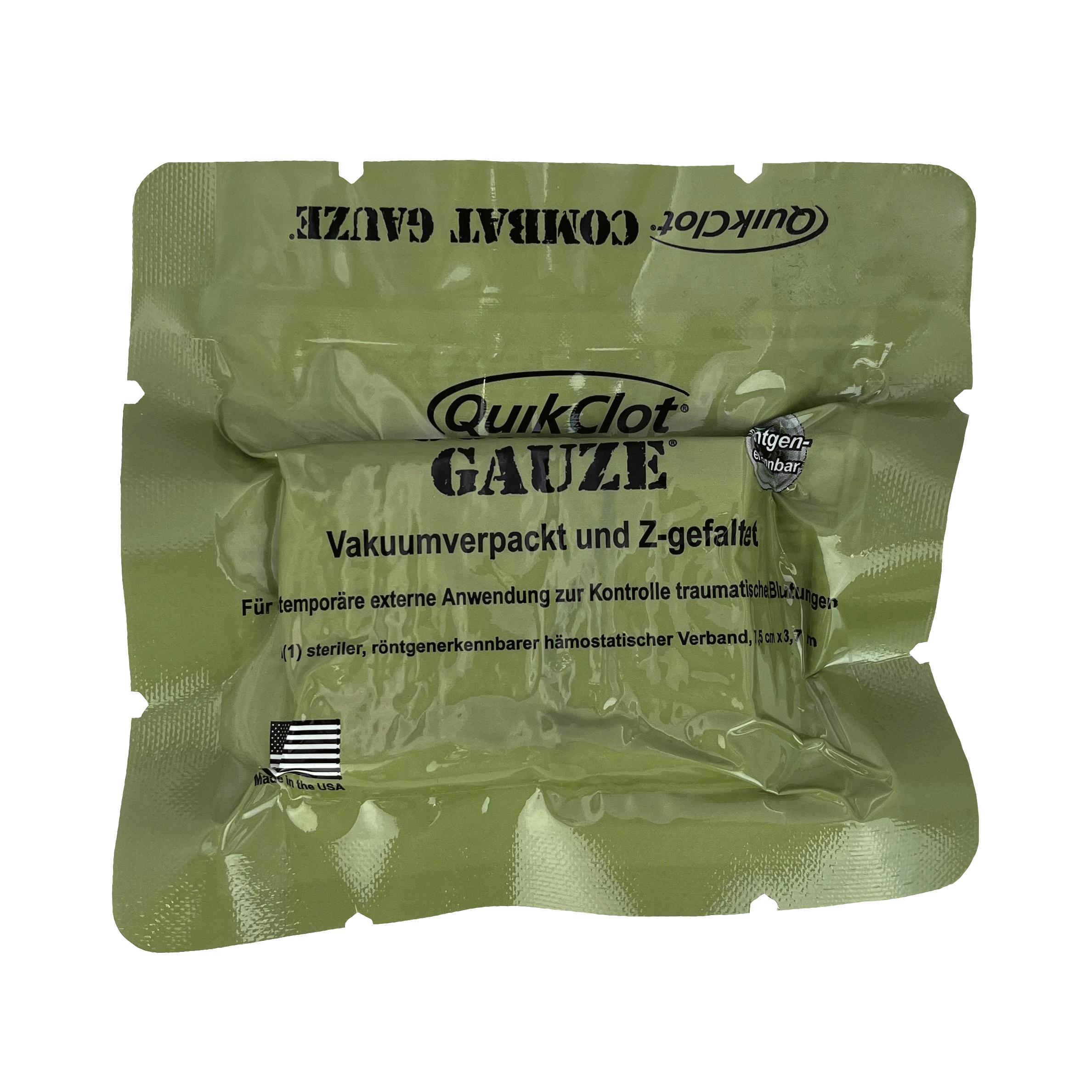 Grüne QuikClot® Z-gefaltet - Gauze, 370 cm Verpackung mit schwarzer Aufschrift, U.S.-Flagge und Hinweisen zur Anwendung bei traumatischer Blutung.