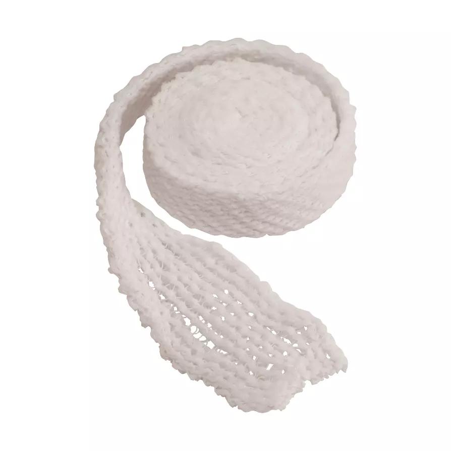 Eine Rolle Weronet® Netzverband mit feinem, weißen Netzmuster, hochflexibel und komfortabel zur schnellen Fixierung von Wundauflagen.