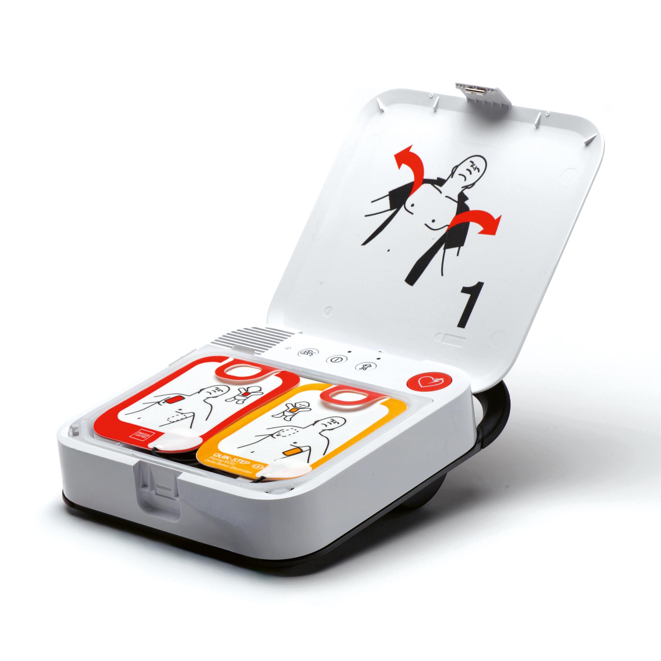 Ein geöffnetes Physio-Control AED Defibrillator-Set LIFEPAK® CR2 mit Griff zeigt eine PULSE CARD mit Schrittanleitungen und farbigen Kompartimenten.