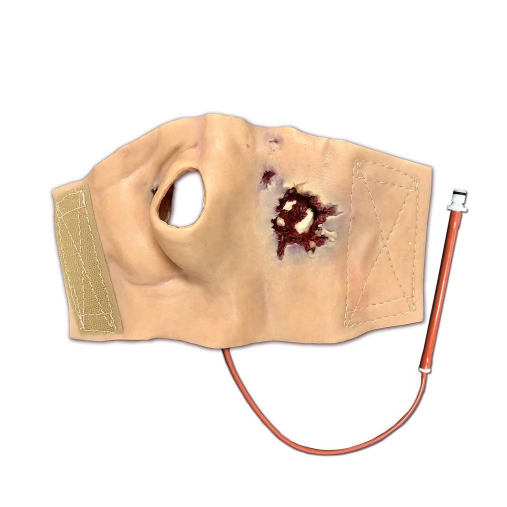 Techline Moulage Schusswunde Hand rechts mit großem simulierten Durchschuss, sichtbaren Gewebeverletzungen und fixierendem Band am Modell.