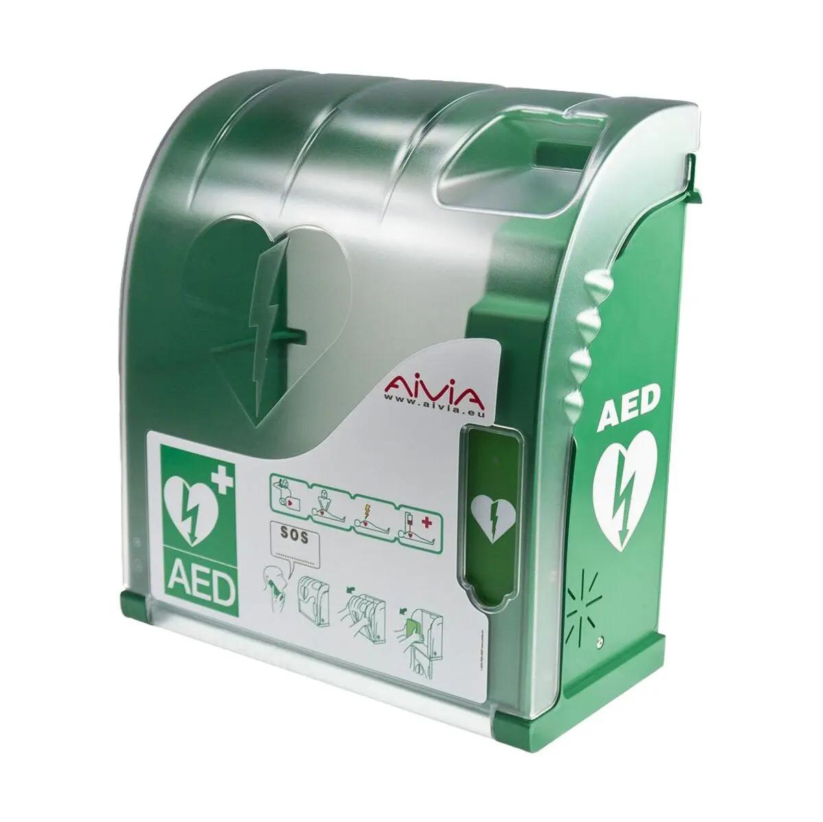 Grüner AED Outdoor-Schrank AIVIA 200 aus ABS/Polycarbonat mit transparenter Kuppel, weißem Bedienlabel, Heizfunktion und seitlicher Klappe.