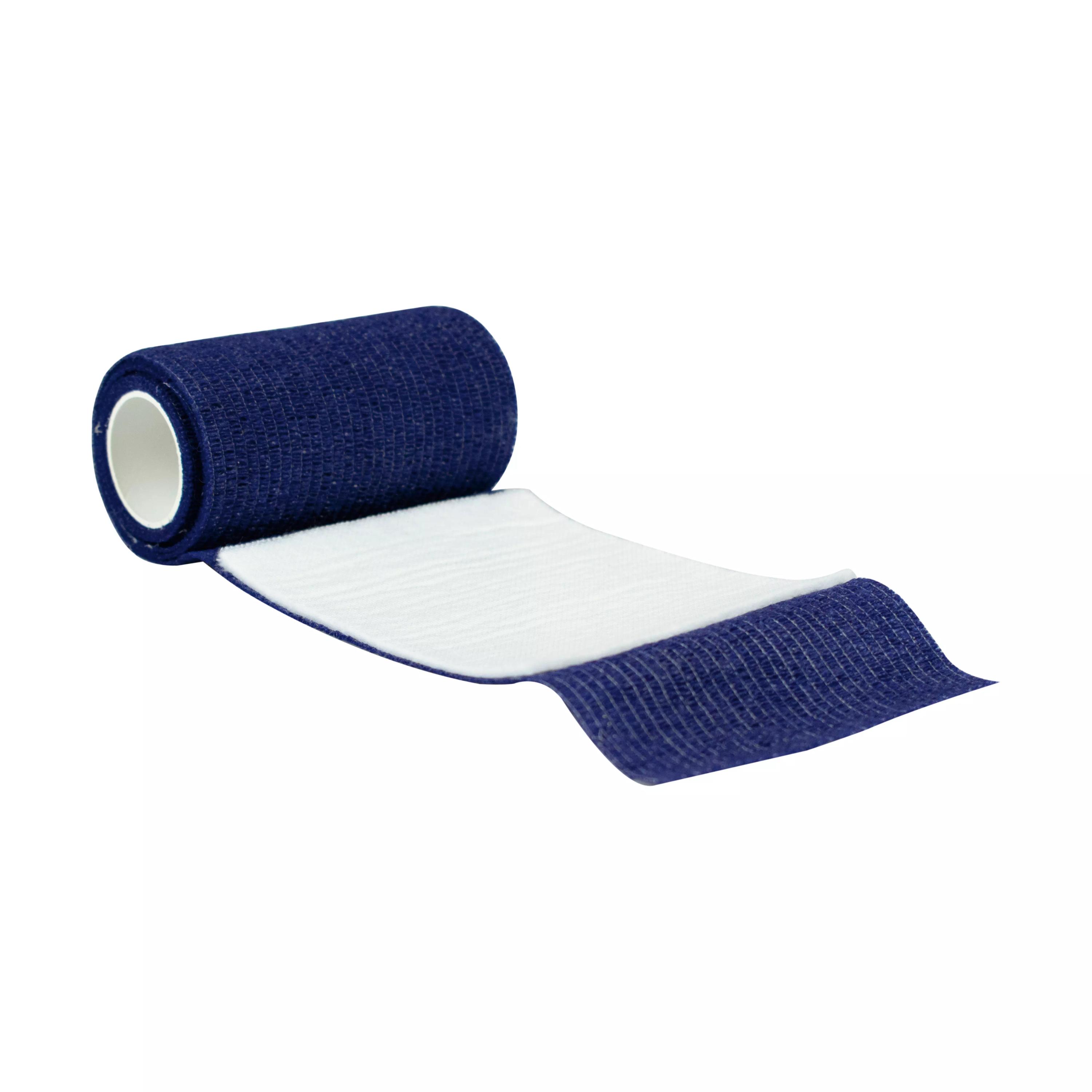 Kompakt aufgerolltes WERO Quick ‘n Easy Verbandpäckchen, steril, in Blau, schnell anlegbar, extra saugstark, ohne zusätzliche Fixierung.