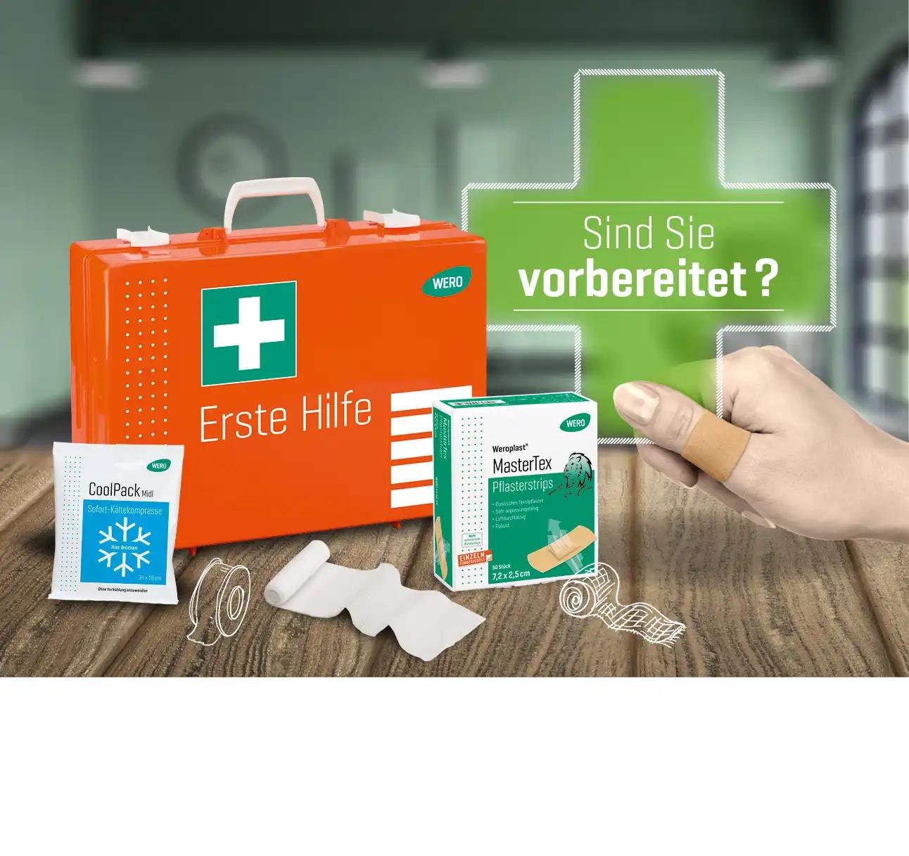 Geschäftsfeld WERO Erste Hilfe. Abbildung Erste-Hilfe-Koffer orange, WERO Cool Pack, Pflasterstrips WERO Master Tex und grünes Kreuz "Sind Sie vorbereitet?"